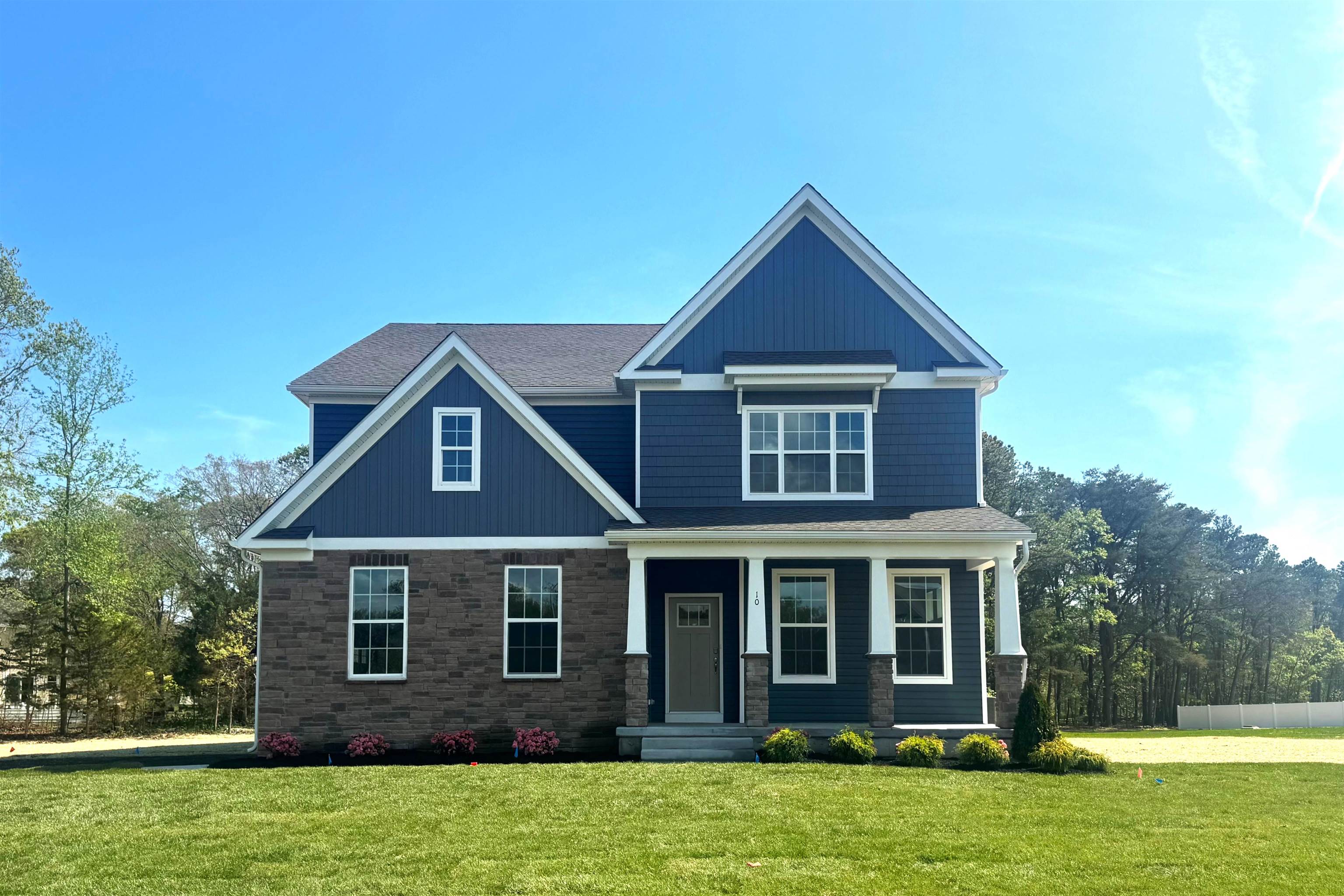 New Construction, Move-in Ready Home!  Final Opportunities in Coastal Cove, a picturesque haven of twelve new construction single-family homes nestled in the highly sought after Upper Township School District and just minutes from the stunning beaches of Ocean City. Coastal Cove offers unparalleled coastal living at its finest!  Discover the convenience of living just minutes from the Garden State Parkway – a commuter's paradise! Embark on leisurely strolls through Corson's Inlet State Park or the Ocean City Dog Park. Indulge in the allure of beachside and boardwalk attractions, explore charming local shops and restaurants, or tee off at the nearby Heritage Links Golf Club. With its array of attractions and amenities, Coastal Cove truly offers something for everyone!  This Hampshire floorplan is a stunning new construction home plan on an oversized 1 acre lot featuring 3,230 square feet of living space, 4 bedrooms, 3 bathrooms, a large loft area and a 2-car garage with side entry. Full Basement Included! The Hampshire is popular for a reason! As you’re welcomed into the home, you’re greeted by the spacious formal dining room, the perfect space to entertain your guests on those special occasions. The foyer opens up to a much desired, open concept living space with a fireplace highlighted by a gourmet kitchen with plenty of counter space, walk-in butlers pantry, double wall oven and an oversized quartz island overlooking the casual dining area and living room.  Upgraded Gourmet Kitchen Appliance Package included! Tucked off the living room is a downstairs bedroom and full bath – the perfect guest suite or home office. Upstairs you’ll find a large loft area, upstairs laundry and three additional bedrooms, including the owner’s suite, which highlights a cozy sitting area, huge walk-in closet and a luxurious bathroom.  Your new home also comes complete with our Smart Home System featuring a Qolsys IQ Panel, Honeywell Z-Wave Thermostat, Amazon Echo Pop, Video doorbell, Eaton Z-Wave Switch and Kwikset Smart Door Lock.  Ask about customizing your lighting experience with our Deako Light Switches, compatible with our Smart Home System!  *Photos representative of plan only and may vary as built.     **Now offering closing cost incentives with use of preferred lender. See Sales Representatives for details and to book your appointment today!