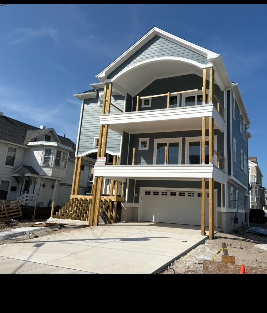 Stunning New Construction Home with Unparalleled Sunset Views right by the bay. Experience luxury living in this exquisite new construction townhome, built by local builder, perfectly designed for both relaxation and entertainment. Featuring expansive exterior decks, this residence offers breathtaking sunset views and a place to enjoy peaceful evenings under the stars. Property Highlights: 5 Bedrooms, 4.5 Bathrooms Generous living space with tiled bathrooms and LVP Flooring. Gourmet Kitchen: Showcasing custom cabinetry, premium Thermador appliances, and a massive kitchen island, perfect for socializing. Open Living Area: Flooded with natural light and centered around a cozy stoned fireplace, the living space provides a warm and inviting atmosphere. Elevator Access: Enjoy effortless convenience to all levels. Two-Car Garage: Offering ample parking and storage options. Spacious yard with the option for a private pool, allowing you to create your own backyard oasis. Embrace the best of both worlds with this home, where serene sunsets and lively community life coexist. Enjoy easy access to dining, shopping, and entertainment, all within walking distance.   Don't Miss Your Chance: This exceptional property is a rare find and one of the extremely limited singles available to purchase in time for a good part of the Summer Season. Contact us today to schedule a private showing and take the first step toward making this stunning home yours.  Completion Mid-July.
