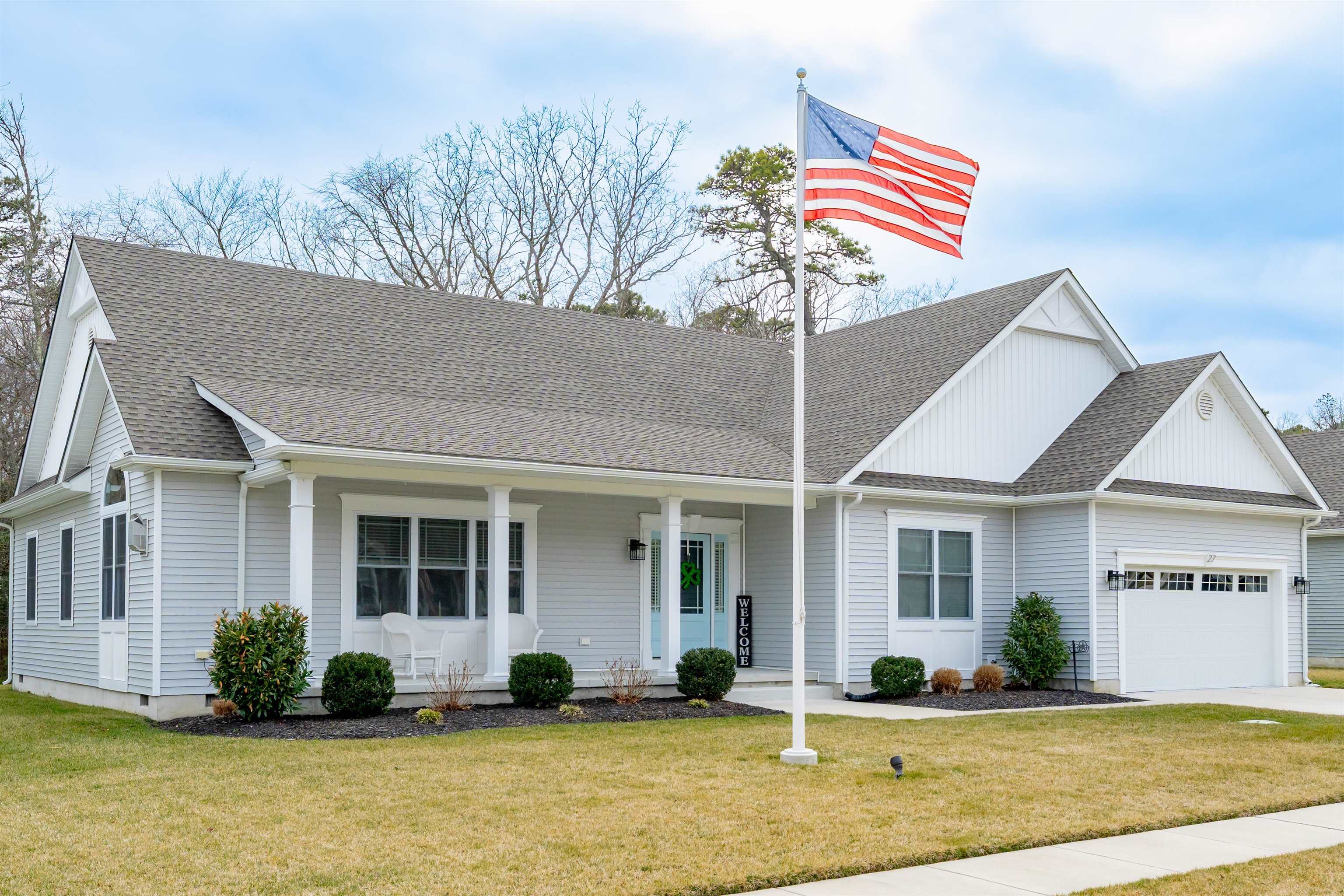 Immaculate 4-year old home in a prime location!  This beautifully maintained, move-in-ready home is ideally situated off Route 9 in Cape May Court House, offering easy access to the Garden State Parkway and is just six miles from the Beaches of Stone Harbor.  Nestled in a friendly neighborhood with city water and sewer, this home boasts and open-concept design perfect for modern living.  A charming covered front porch welcomes you, ideal for relaxing.  Inside, there is a tiled foyer leading to the spacious living room featuring hardwood floors and a corner gas fireplace, seamlessly flowing into the dining area and large kitchen.  The kitchen is a chef's dream with a center island, granite countertops, subway tile backsplash, stainless steel appliances, a pantry closet and a breakfast bar.  The sellers also added a stylish built-in bar area with a wine cooler.  A sliding glass door opens to an inviting screened-in porch, perfect for entertaining or unwinding and private back yard, complete with a storage shed, overlooks a serene conservation area, offering both tranquility and privacy.  This home offers three bedrooms, two full baths, and a well-appointed laundry room with built-in cabinetry, laminate flooring, and a folding counter.  The primary suite includes a large walk-in closet and an oversized tile shower and a double vanity.  The attached two-car garage comes equipped with an automatic opener and houses the heating system and water heater.  Also included is the very patriotic flagpole in the front yard.  Don't miss this incredible opportunity to own a pristine home in a fantastic location!