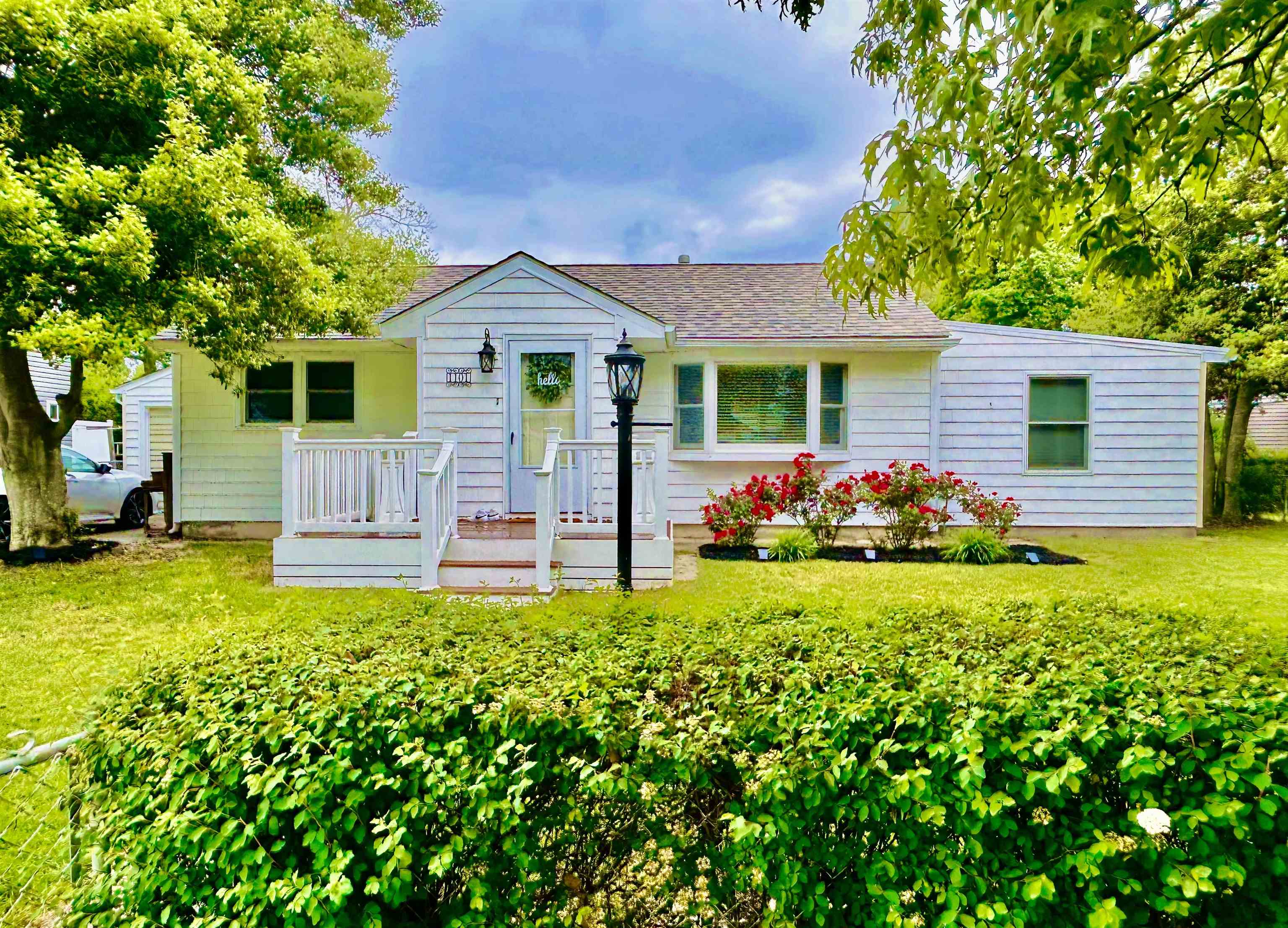 Charming 3-Bedroom, 2-Bath Home in North Cape May - Just 6 Blocks from the Bay!  Nestled in a quiet and desirable neighborhood of North Cape May, this beautifully updated 3-bedroom, 1 1/2 -bath home is the perfect blend of comfort and convenience. Just 6 blocks from the bay, you'll enjoy stunning sunsets and the easy access to beautiful beaches that this location offers.  Inside, you'll find a spacious and open layout that is perfect for both relaxing and entertaining. The newly expanded family room provides an abundance of space for gatherings, while the oversized primary bedroom offers a peaceful retreat. Both the family room and primary bedroom are newly updated to provide you with modern, comfortable living.  The kitchen has a large pantry for added storage and functionality, and the adjacent dining room and living room are perfect for family meals or hosting guests. Whether you're unwinding with a cozy evening in front of the electric fireplace or enjoying the outdoors in your fenced-in yard, this home offers plenty of opportunities to relax and enjoy life at the shore.  This home offers a prime location with easy access to all the best amenities in  Cape May, including beaches, shops, and restaurants. If you're looking for a coastal retreat that combines style, space, and proximity to the water, this home is a must-see!  Don't miss out on this fantastic opportunity to own your own piece of paradise. Contact us today to schedule a showing!  Please see adjoining MLS 251006 for possible multi-generational families.