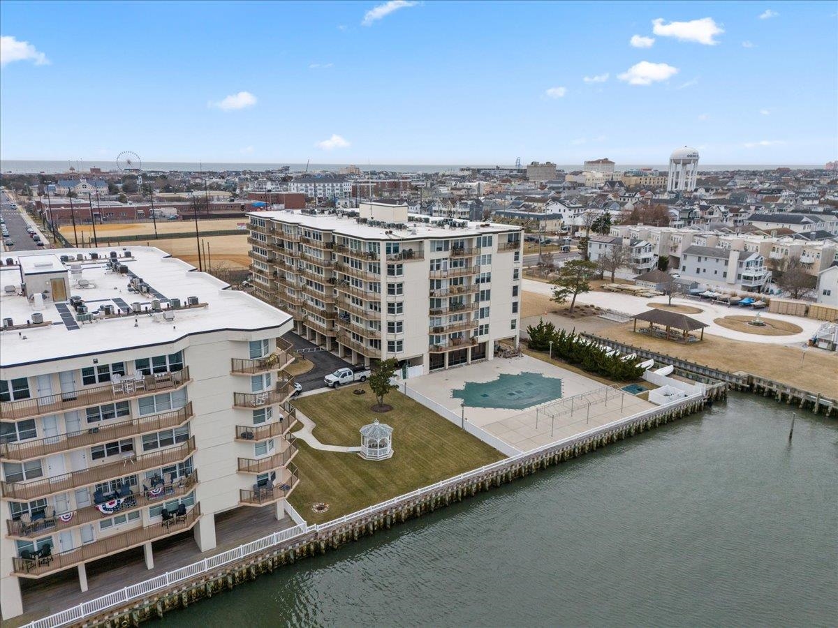 This well maintained 2-bedroom, 2-bathroom condo offers breathtaking water views and a perfect blend of charm and comfort. Located directly on the bay, this property invites you to relax and enjoy waterfront living at its finest. Step inside to find an open concept living space bathed in natural light, with large windows. The dining room flows seamlessly into a spacious kitchen equipped for entertaining guests or enjoying a quiet morning coffee. The primary bedroom features an ensuite bath and generous closet space, providing a peaceful retreat with water views. A second bedroom offers flexibility for guests or a home office, while the additional full bath ensures convenience and privacy. Outside, the private deck allows you to soak in bayfront sunsets. Whether you’re looking for a year-round residence or a weekend getaway, this bayfront gem delivers the best of coastal living. Don’t miss the chance to make it your own!