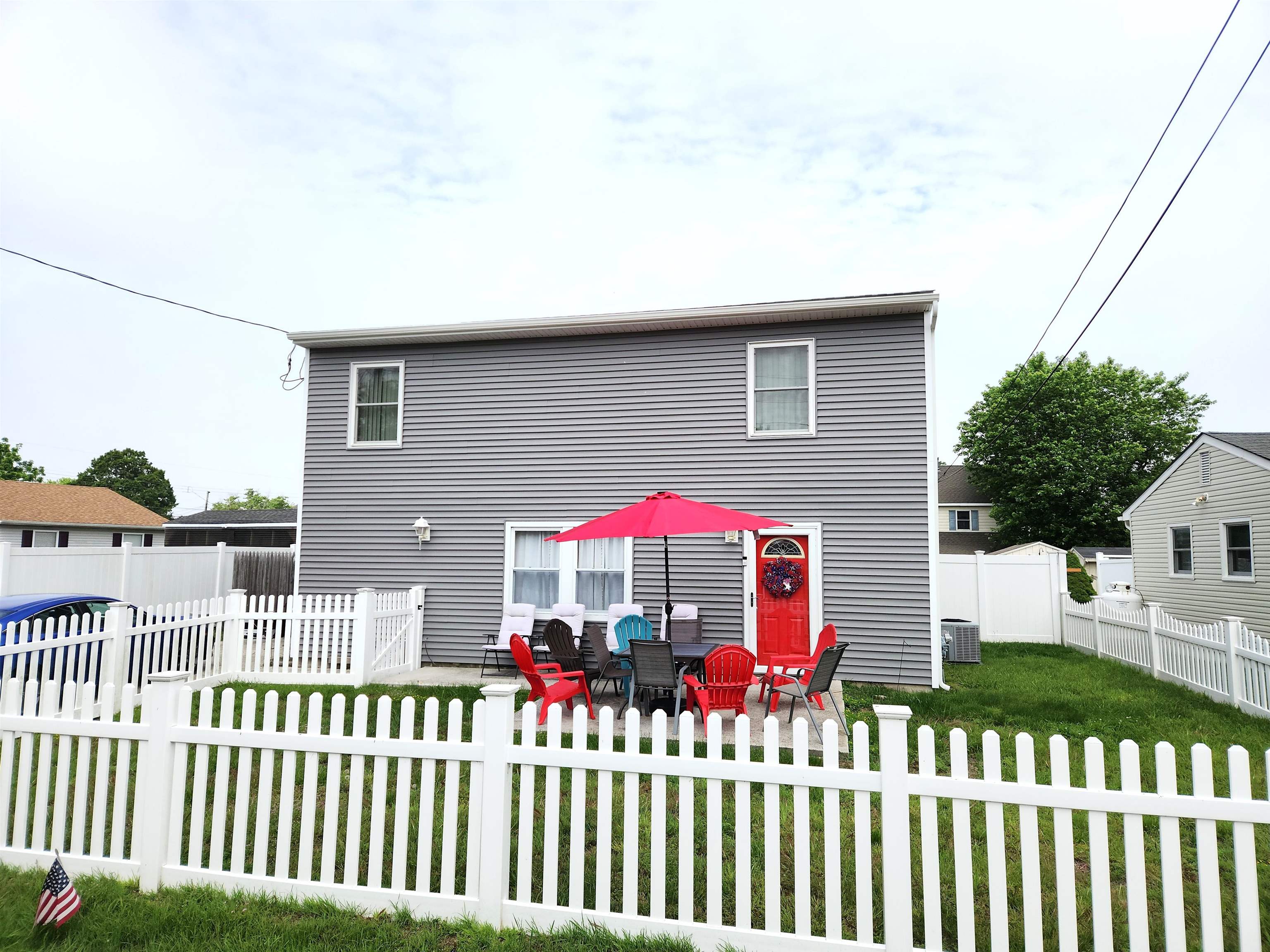 Welcome to this charming 4-bedroom, 1-bath two-story home in desirable North Cape May, just a short walk from the Delaware Bay and its breathtaking sunsets. Situated on a generous fenced-in lot, this home features a newly added front patio and an additional enclosed yard area—perfect for young families or pet lovers. Inside, the traditional floor plan offers a spacious family room that seamlessly connects to the kitchen and dining area. The first floor includes a versatile bedroom currently used as a home office, plus a full bath. Upstairs, you'll find three more bedrooms and a utility closet with potential for a second full bath. With its prime location near the bay and room to customize, this property is a fantastic opportunity to create your dream shore retreat.