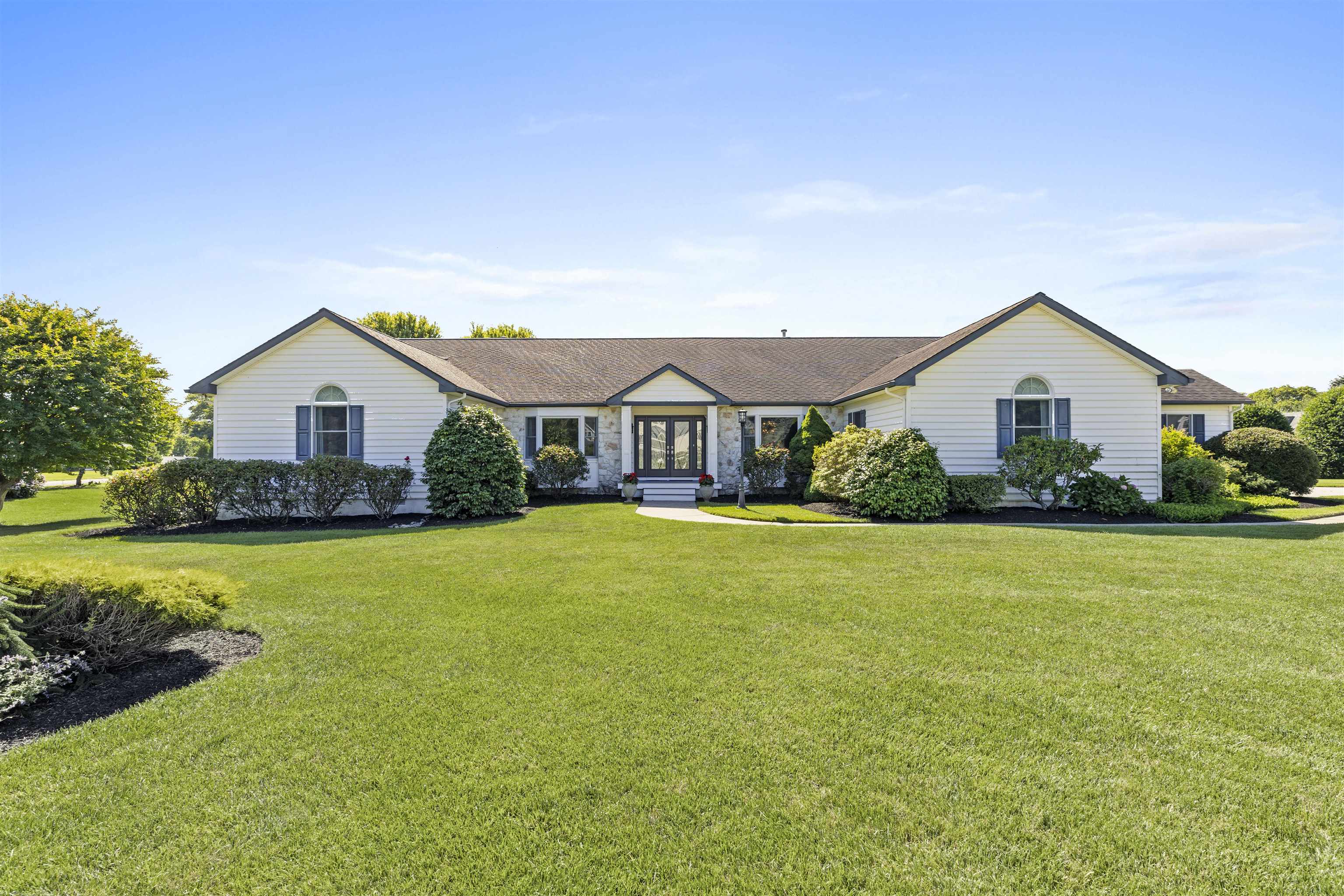 Elegant Coastal Living Just Minutes from Downtown Cape May Welcome to 10 Strawberry Lane - an extraordinary, fully renovated home in the sought-after Taylor Farms community. Thoughtfully upgraded with high-end finishes and modern luxury, this home offers a refined lifestyle just minutes from Cape May’s beaches, dining, and historic charm. Step through the custom-designed front door into a spacious open-concept layout. The gourmet kitchen is a chef’s dream, featuring Signature Kitchen Suite appliances, Wood-Mode cabinetry, beautiful granite countertops, and an impressive double oven range with gas burners, induction cooktop, and built-in sous vide. The space opens into a bright and inviting living area with custom built-in shelves and a double-sided fireplace shared with the large formal dining room, perfect for entertaining. Built-in surround sound adds ambiance throughout. The primary suite offers a peaceful escape, complete with a luxurious ensuite bath featuring heated floors. Two additional bedrooms include one with an ensuite bath accessible from the hallway and a third with convenient access to a full hall bath. KraftMaid cabinetry is featured in all bathrooms, enhancing the home’s cohesive style and quality craftsmanship. Additional Features Include: Two-zone heating and air conditioning, Heated floors in the primary bathroom, Spacious laundry room with pull-down attic access, Oversized 3-car garage and large driveway, 12-zone irrigation system, Professionally landscaped yard with privacy hedge, Heated in-ground pool, gazebo, and a beautiful outdoor shed, Water softener system. This exceptional property blends timeless style, thoughtful upgrades, and a prime location—making 10 Strawberry Lane a truly rare offering.