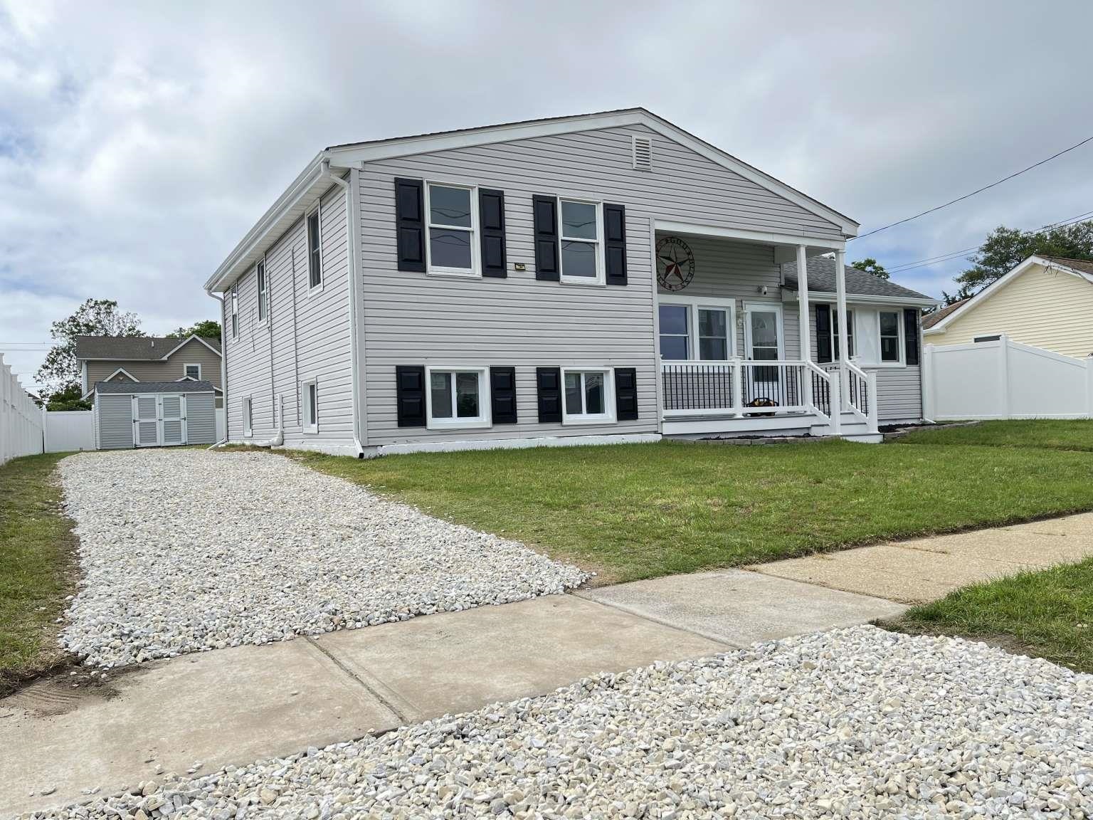 Beautiful renovated Split Level Home near the Delaware Bay and the David Douglass Memorial Park, beach and Ferry Jetty , This home features four bedrooms, new renovated bathiroom with ceramic tile floor, kitchen with new cabinets and granite counter top including the range, dishwasher, microwave and refridgerator. Large utility room with storage closet. Storage shed, stone driveway, Central air and Natural gas heating. This home is freshly painted and has new laminate vynal flooring throughout. This is a great location and close to Cape May and Wildwood boardwalk and beaches.