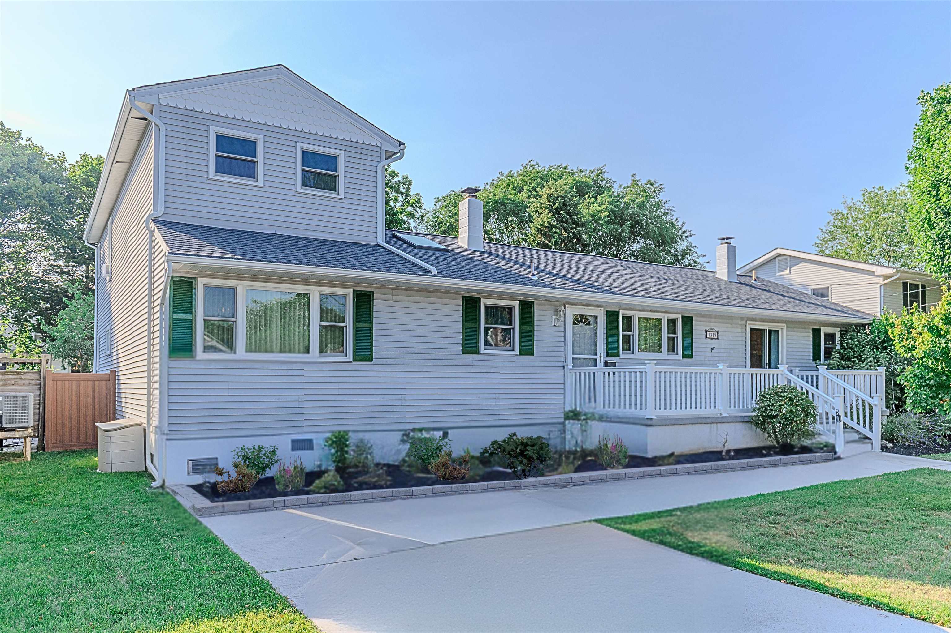 Welcome to this beautifully maintained Cape May residence, nestled on an oversized 75x125 ft. lot—offering room to breathe, entertain, and enjoy life by the shore all year long. This rare gem seamlessly blends timeless charm with modern comforts and a flexible layout ideal for a variety of lifestyles. The main home features 3 spacious bedrooms and 2.5 thoughtfully designed baths. At its heart is a stunning gourmet kitchen with double ovens, double sink, an additional bar sink, and a large center island—perfect for entertaining and effortless everyday living. The kitchen also offers a massive amount of cabinetry and storage, making it a chef’s dream come true. It opens to an oversized dining room and a bright, airy family room, creating a warm, open-concept space filled with natural light. The dining room is ideal for hosting large family gatherings or entertaining guests in style. Just off the family room, you’ll find a generous laundry room, a convenient half bath, and a beautiful all-seasons sunroom that opens to a rear deck overlooking the open backyard. The expansive green space is a rare find in Cape May—offering ample room for a future pool, outdoor entertaining, or simply enjoying the outdoors in privacy and comfort. The yard is fully enclosed with newer vinyl fencing, and a detached, climate-controlled cottage offers additional space ideal for a home office, artist studio, or poolside retreat. Two bedrooms and 1.5 baths are located on the main level, while the entire second floor is dedicated to a luxurious primary suite. Enjoy hardwood floors, a spacious walk-in closet, and a spa-like bath with a walk-in shower and soaking tub—your own private escape. An attached 2-bedroom, 1-bath apartment with a separate entrance and utilities offers incredible flexibility. Whether used for guests, extended family, or as a rental opportunity, this additional space enhances the home's year-round versatility and value. Additional Highlights Include: Newer roof Newer central heating and air conditioning All-new Andersen windows throughout Large front porch Outdoor shower Generous off-street parking Located just minutes from Cape May’s beaches, restaurants, and historic downtown, this property is bikeable to everything you love about the shore, yet privately tucked away on a rare, oversized lot. This move-in ready home is a true coastal haven—perfect for full-time living, vacationing, or hosting. Come see it for yourself and experience all that Cape May living has to offer.