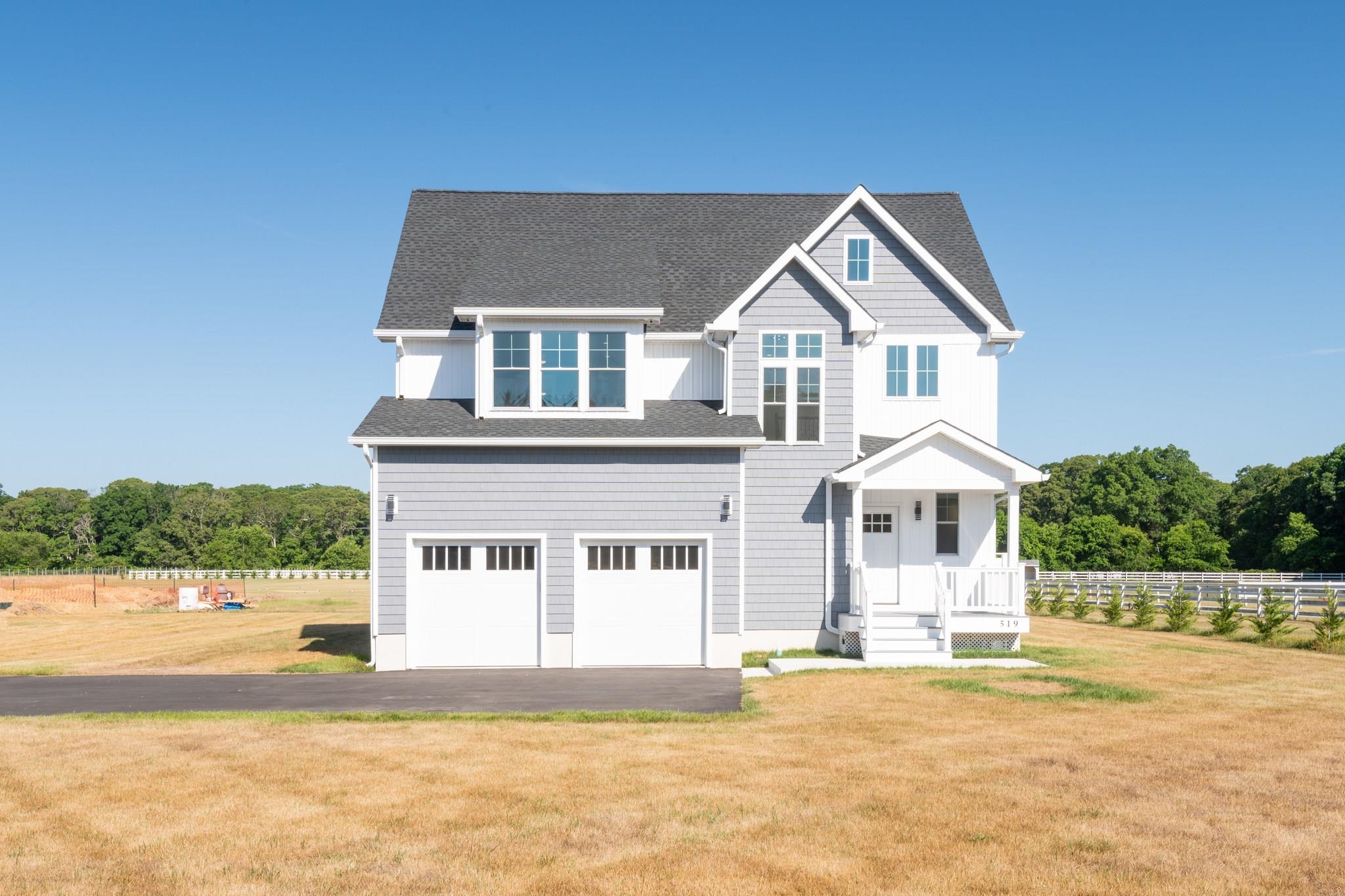 Gorgeous new construction in country setting but so close to all the Southern Cape has to offer. Beaches, boating, nature trails, bike paths, wineries, breweries, restaurants, shopping, entertainment areas all a short drive away - get the best of both worlds! First floor includes foyer with open staircase, access door to spacious two-car garage, large great room with gas fireplace with beautiful designer tile surround, large kitchen with center island, dining area, pantry, laundry room, first-floor primary bedroom with large en-suite bathroom and walk-in closet. Second floor includes jack-and-jill style bedrooms/bathroom, another junior suite bedroom with private bathroom, a den/sitting area, walk-in storage space plus additional attic space above, extra closet/storage. State of the art smart home system with cameras and fully integrated sound system installed throughout home with several different zones for sound. Info on smart home system in associated docs. Large deck off of kitchen, outside shower and enclosure, and a large 1.32-acre lot! Plenty of room for pool and/or gardens. Contact agent with questions. Some photos are virtually staged. Check out video tour!