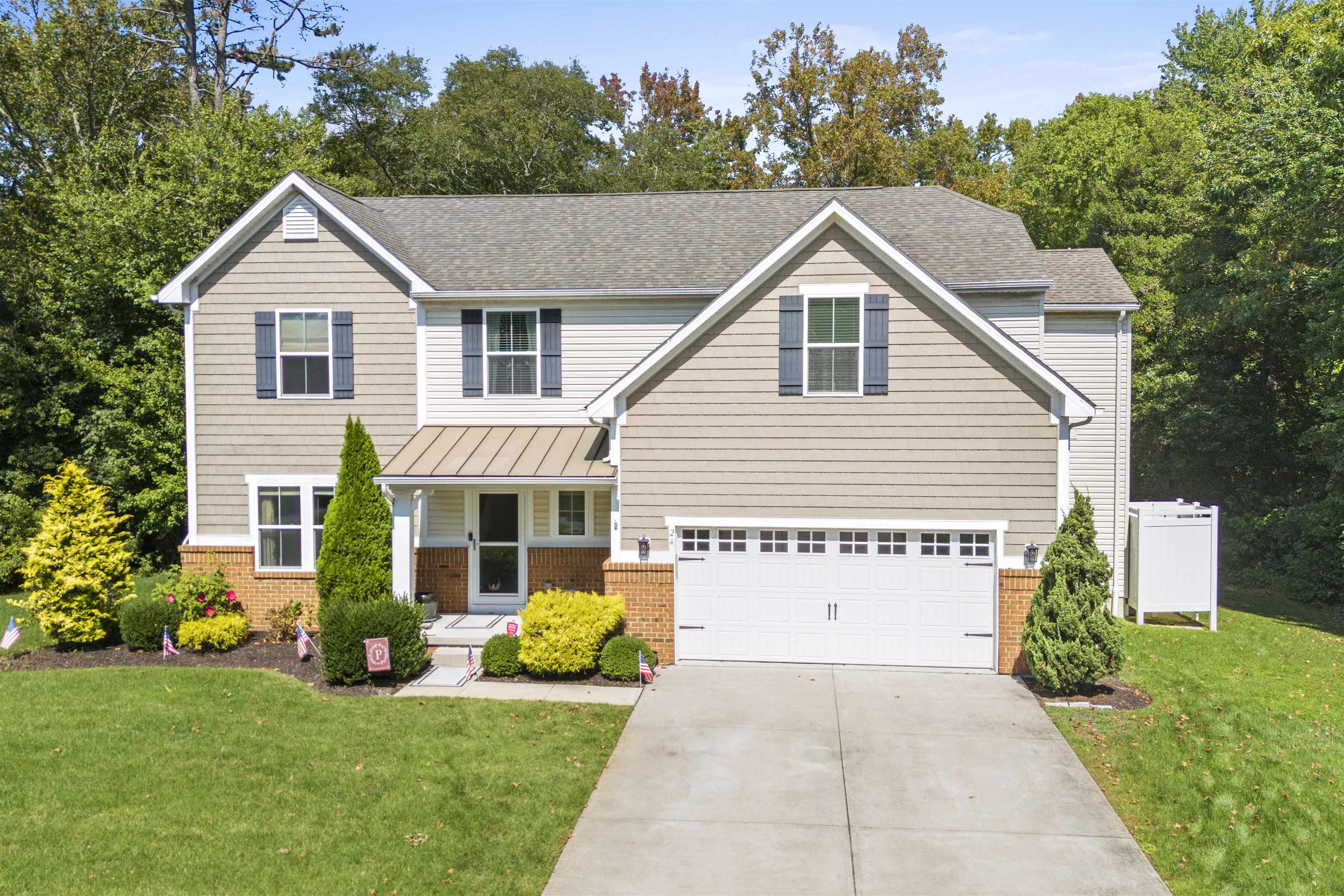 Just Listed! Nestled at the end of Seagrove Avenue in a private cul-de-sac, this home offers the perfect blend of privacy, space, and convenience. Set on 1.5 acres, it provides a secluded retreat while still being just minutes from the pristine beaches, dining, and shops of Avalon and Stone Harbor. Built in 2014, this thoughtfully designed property is ideal as a year-round residence or a summer escape. Step inside to a bright and welcoming foyer with a half bath, leading into an open-concept kitchen and living area that’s perfect for gatherings. A formal dining room adds space for entertaining, while a first-floor bedroom or office with an adjoining full bath offers flexible living options. The second floor is designed for comfort, featuring five bedrooms and two full baths, including a spacious primary suite with a sitting area and private deck overlooking the rear yard. A second-floor laundry room adds convenience to everyday living. Interior highlights include wood flooring, a custom kitchen, two-zone heating and air conditioning, high-end window treatments, designer wallpaper, and abundant closet and attic storage. Outside, enjoy summer living with an above-ground pool, a covered patio, and plenty of space for entertaining. The two-car garage features side yard access and an outdoor shower, with epoxy-coated floors in both the garage and crawl space. A concrete driveway provides generous parking for family and guests. This is a unique opportunity to own a private retreat close to the shore—whether you’re searching for a full-time residence or the ultimate summer getaway, 24 Seagrove Avenue is a home that truly has it all.