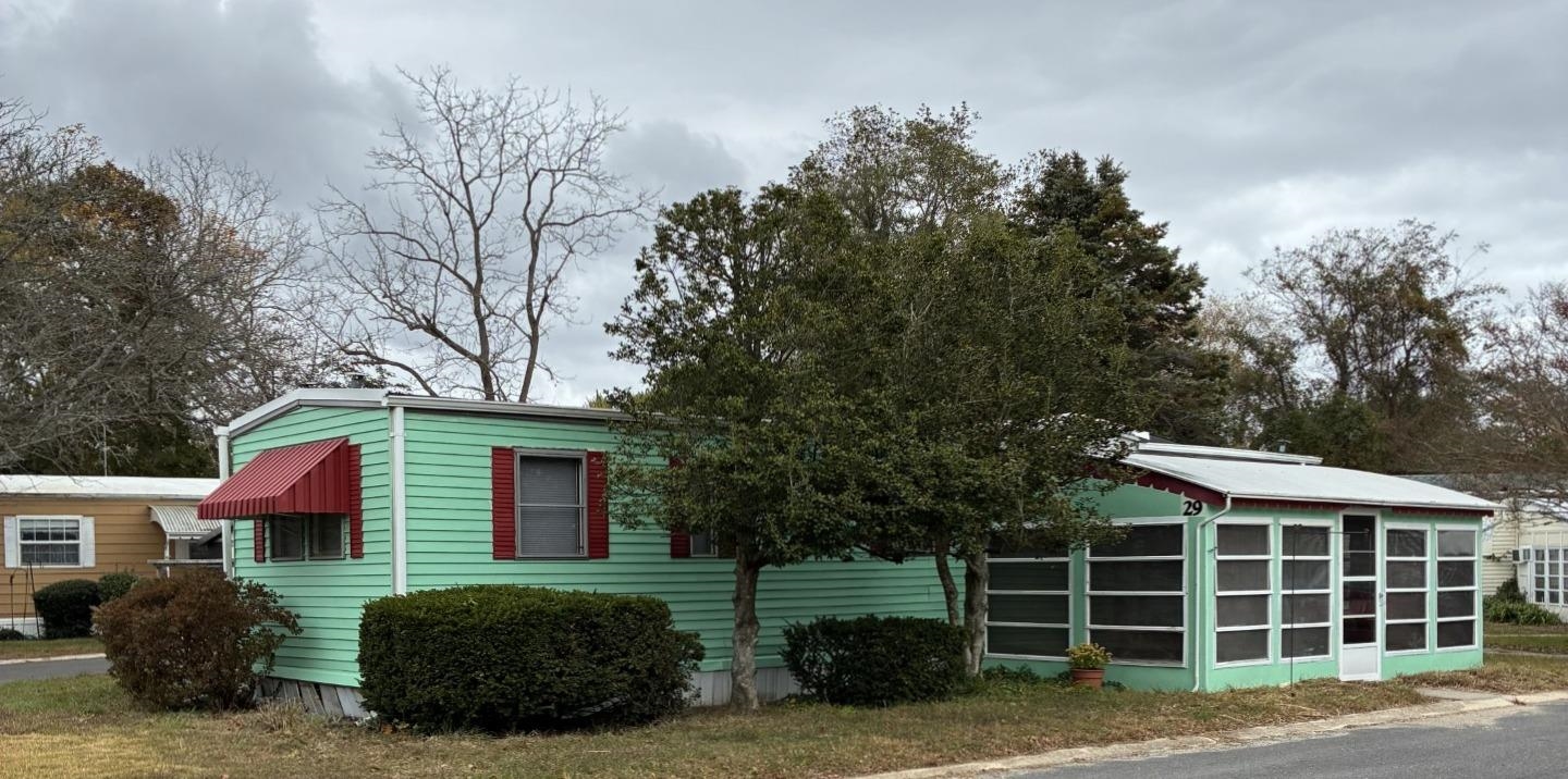 Coastal Living in a Premier 55+ Community  Welcome to Westwood Estates Adult Community—the perfect opportunity to secure a low-maintenance, year-round residence in highly desirable West Cape May, just moments from the beach and local attractions! This charming, manufactured home offers a comfortable layout with 2 bedrooms and 1 bathroom. Key Features You'll Love: Updated Kitchen: Enjoy a modern cooking space with current finishes, ready for your culinary creations. Florida Room: A major upgrade offering bright, extra living space perfect for relaxing, reading, or entertaining guests year-round. Move-In Ready: The home features many quality upgrades throughout, allowing you to move in and immediately start enjoying the coastal lifestyle. Prime Location: Situated South of the Cape May canal, you are close to dining, shopping, farmer's markets, and the iconic beaches of Cape May and West Cape May. Low-Maintenance Lifestyle: The monthly lot fee of $630 covers essential services, providing exceptional value and hassle-free living: Water, Sewer, Trash Pick-up, Snow removal, Important Terms: This sale is a land-lease opportunity in an Active 55+ Community. The transaction is contingent upon management approval, requiring a successful credit and background check for all prospective buyers. Don't miss out on this fantastic opportunity for affordable coastal retirement