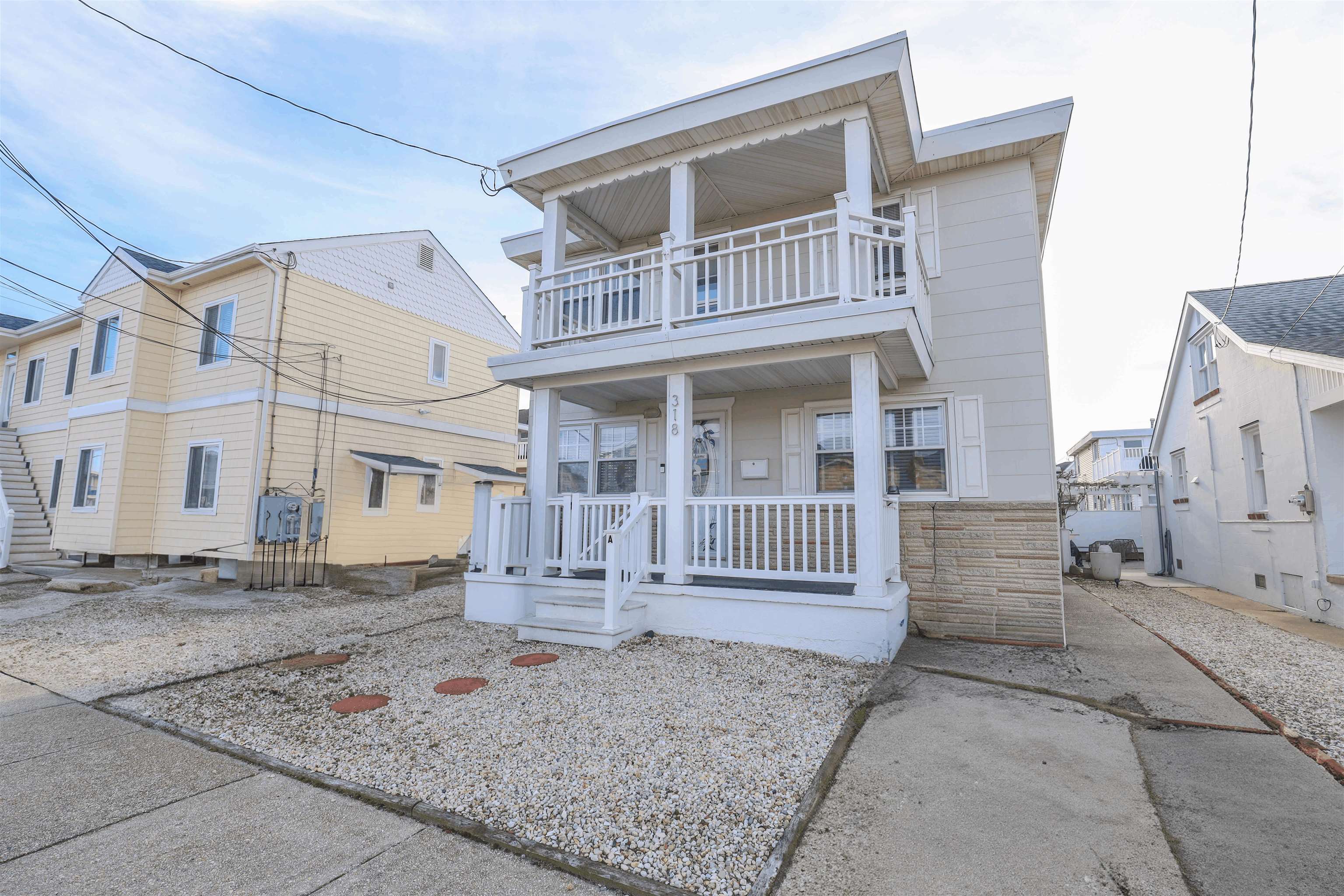 Welcome to your dream coastal retreat in beautiful Wildwood Crest! This fully renovated 2-bedroom, 2-bath condo offers ocean views from your front porch and an unbeatable location—just steps from the beach and the shimmering Atlantic Ocean.  Located in the most sought-after area on the entire island in the Southern end of the Crest, this immaculate unit features a bright, open concept living area, updated kitchen with modern cabinetry and stainless-steel appliances, and two spacious bedrooms including a primary suite. The interiors are tastefully finished with contemporary touches throughout—ready for you to move right in and start enjoying the beach life.  Enjoy year-round living in this pet-friendly community, with low taxes and low condo fees that make this an exceptional value. Relax on your private balcony as you take in the ocean breeze, spend your afternoons on the sand, and enjoy everything Wildwood Crest has to offer—all just minutes from dining, shopping, and entertainment.  Whether you’re searching for a vacation getaway, investment property, or full-time home, this condo checks every box for location, lifestyle, and value. Don’t miss this rare opportunity to own a piece of paradise by the sea!