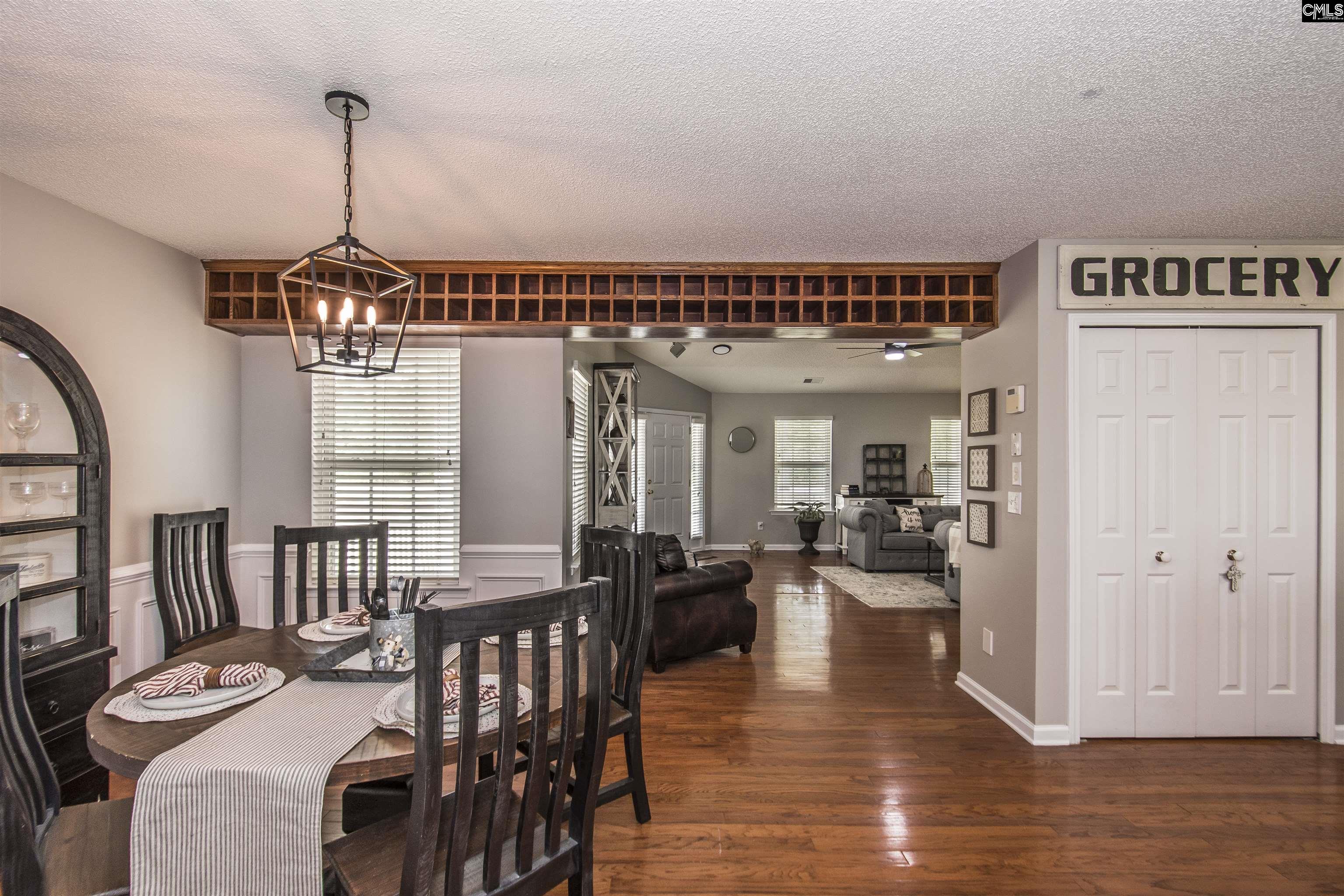 Enter the home with this gorgeous vaulted ceiling, hardwood floors surroundsound audio system
