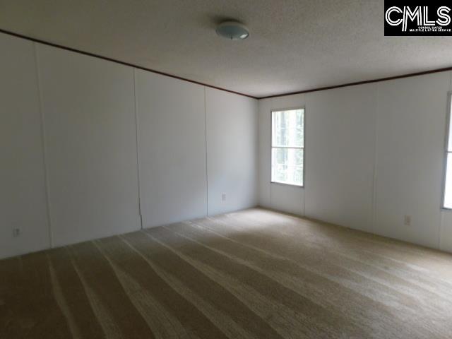 FEATURES SPACIOUS WALK IN CLOSET, PRIVATE BATH WITH DOUBLE VANITIES, SEPARATE SHOWER AND GARDEN TUB