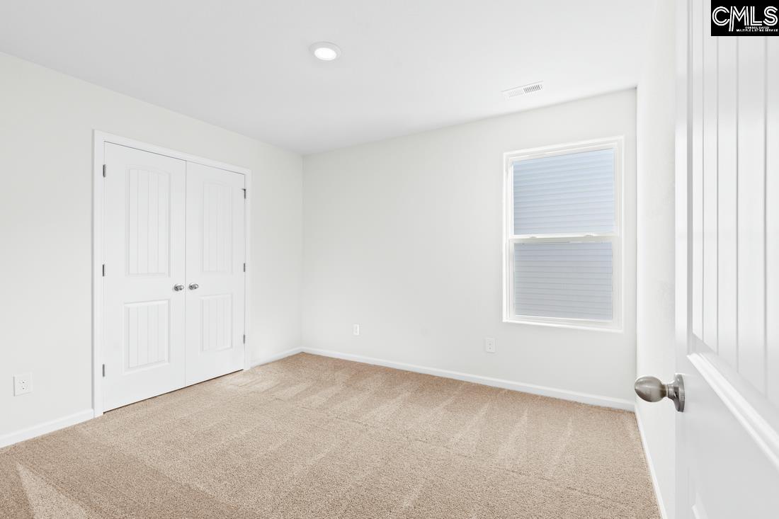 The second bedroom features one window and a private closet.