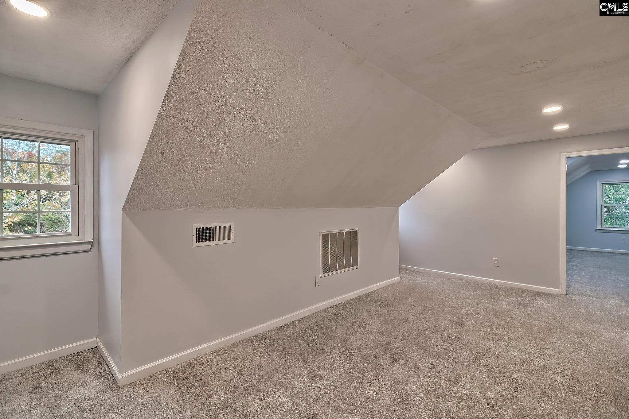 This can be a 6th Bedroom -  has a closet too!