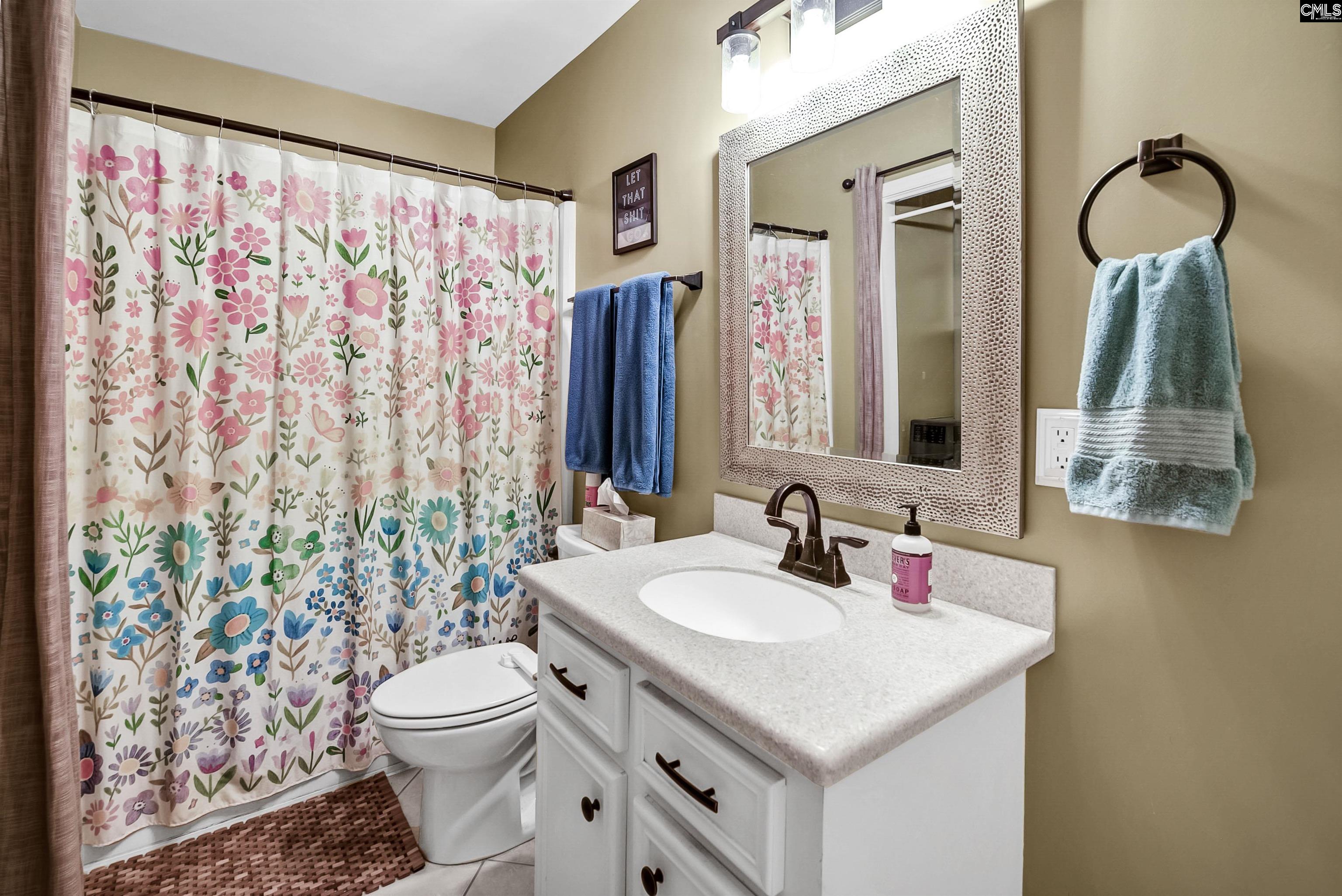 Updated bathroom with separate Laundry