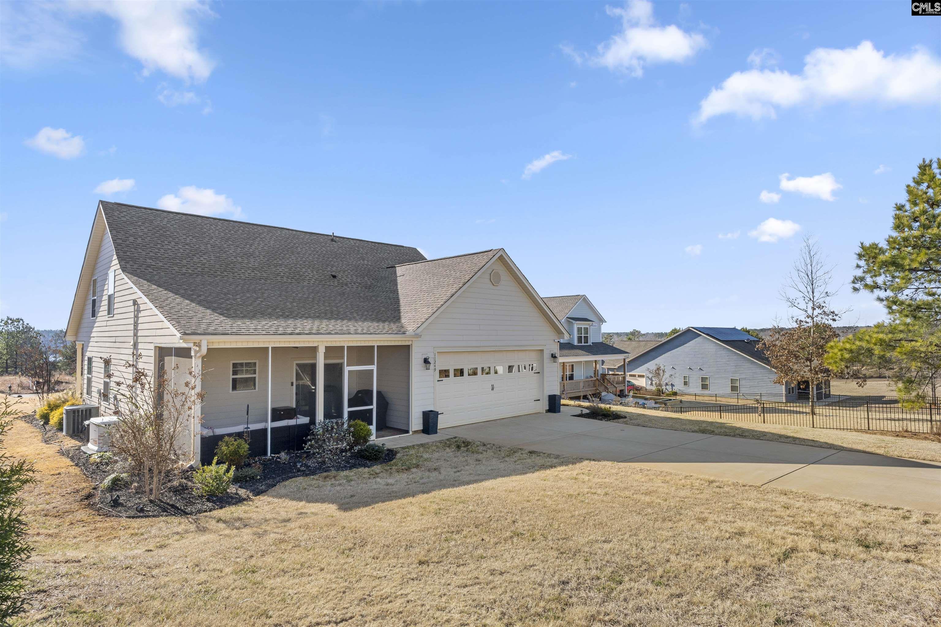 Long rear load driveway with oversized 516 sq ft garage