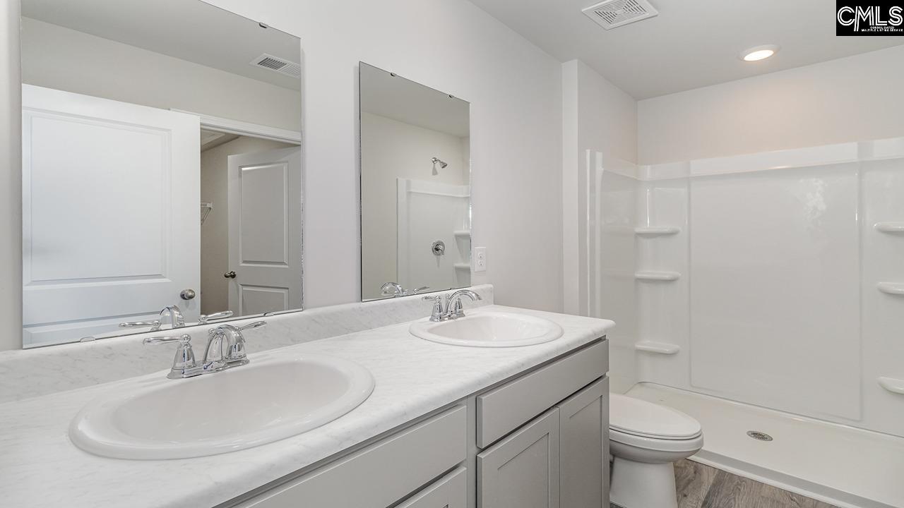 (Shower may have glass front)