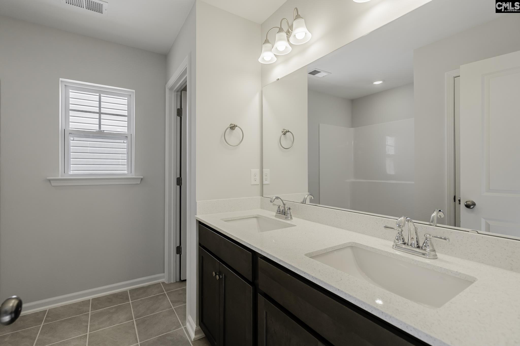 Dual vanities, walk in shower