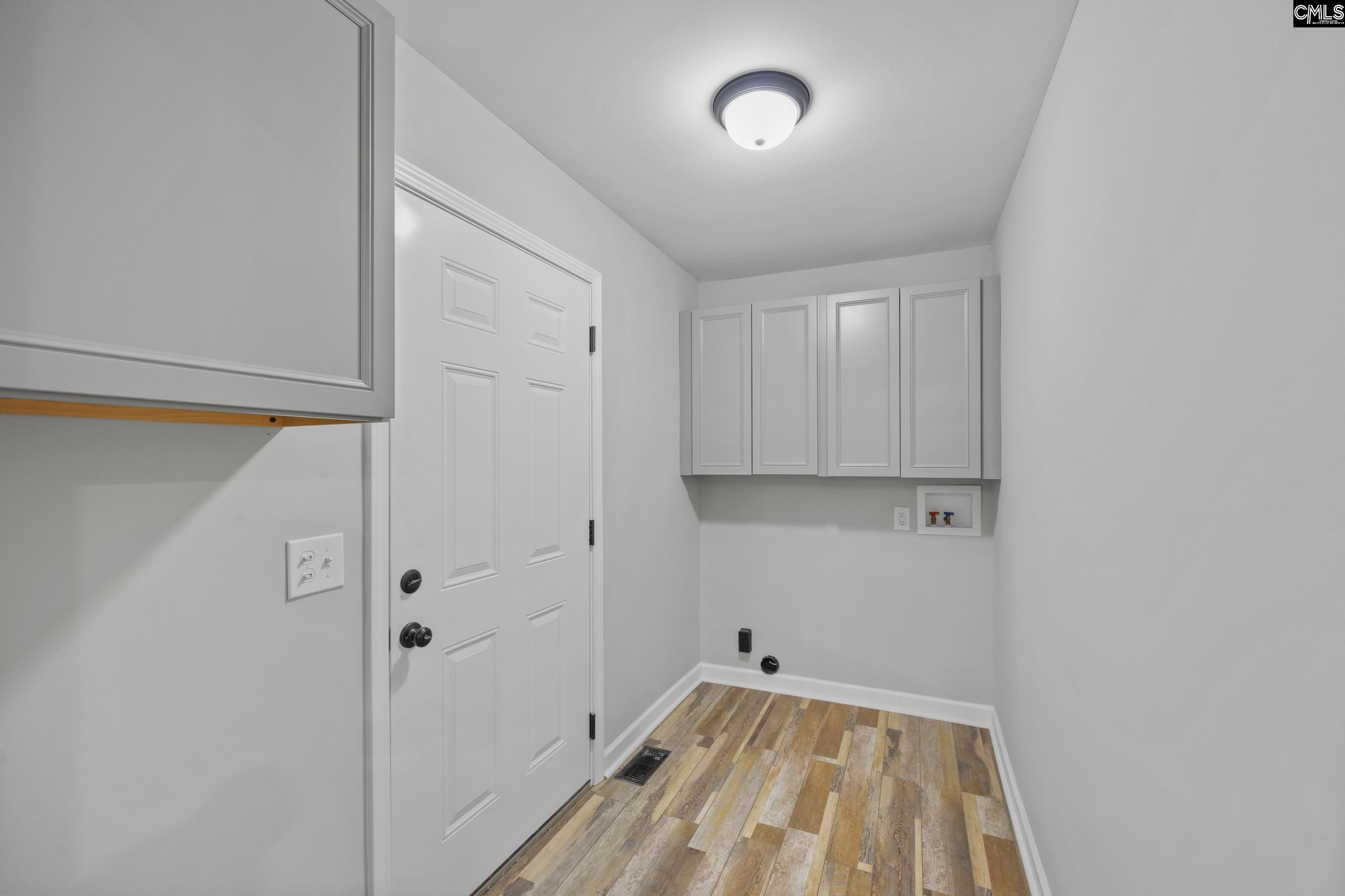 Garage door on the Left.