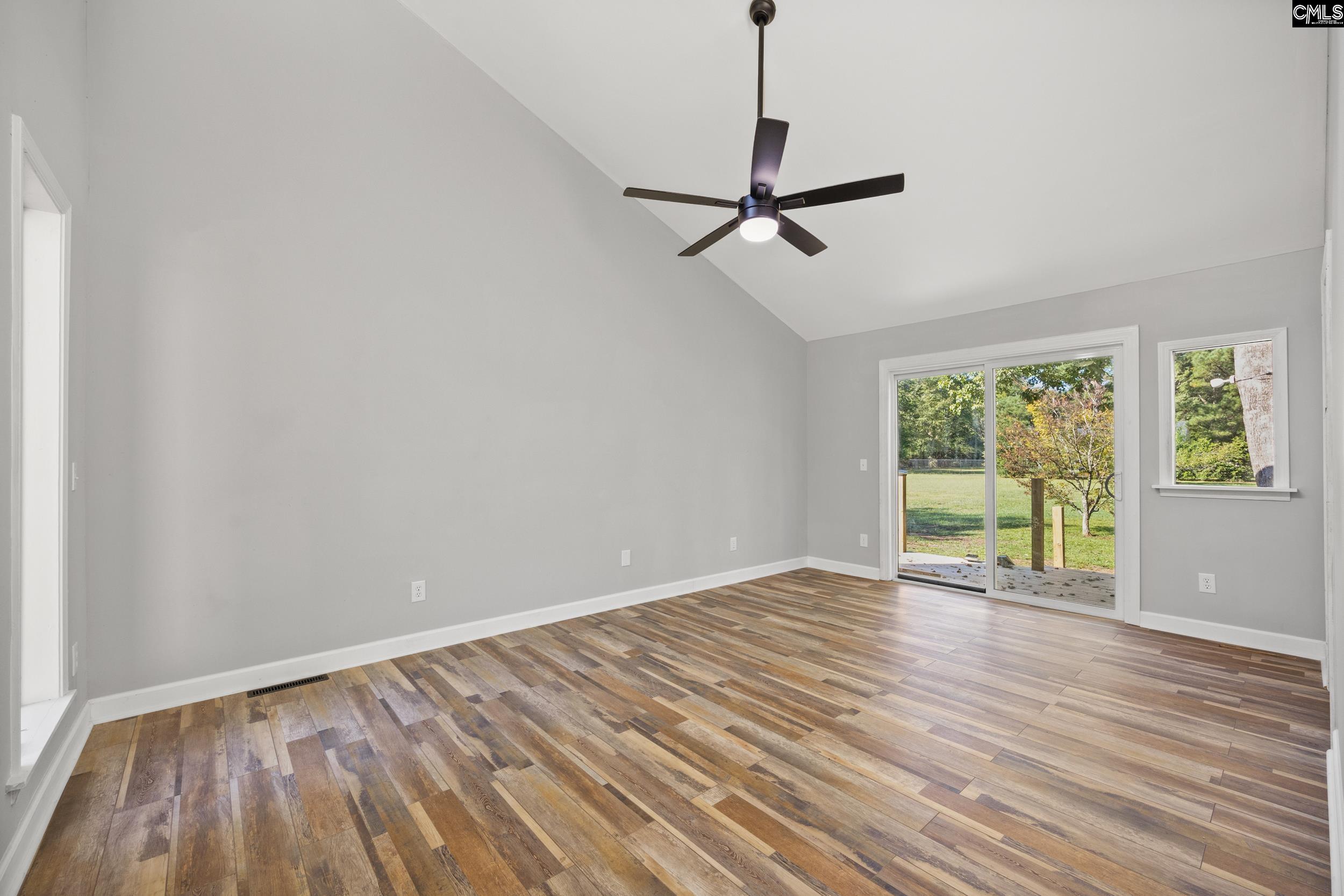 Has two skylights and sliding glass doors walking out to a porch overlooking the Backyard