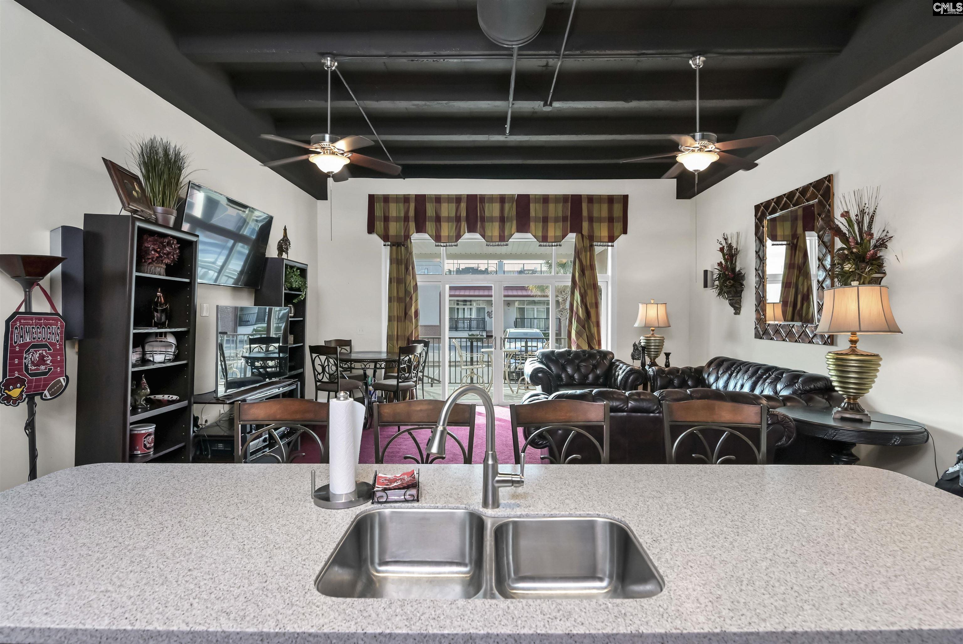 View of front from you kitchen bar area. High quality quarts countertops