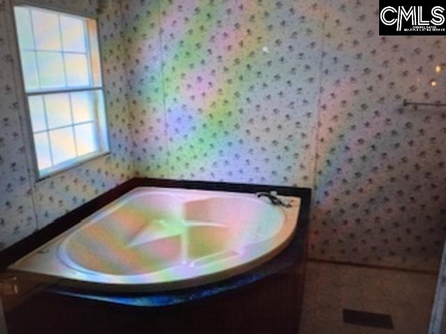Master bathroom large corner tub