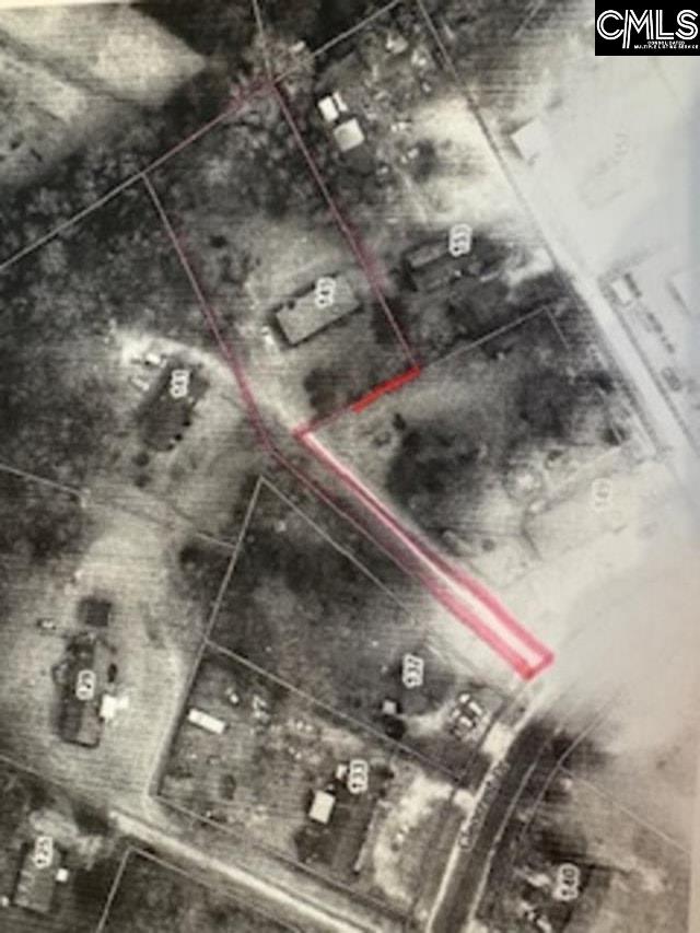 Satellite view of property: subject property highlighted in pink.