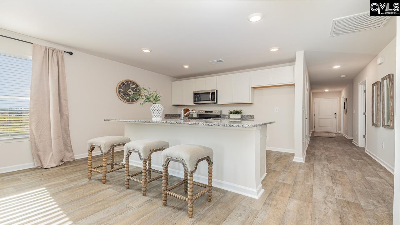 *White is pictured, but this home will feature GRAY cabinetry.