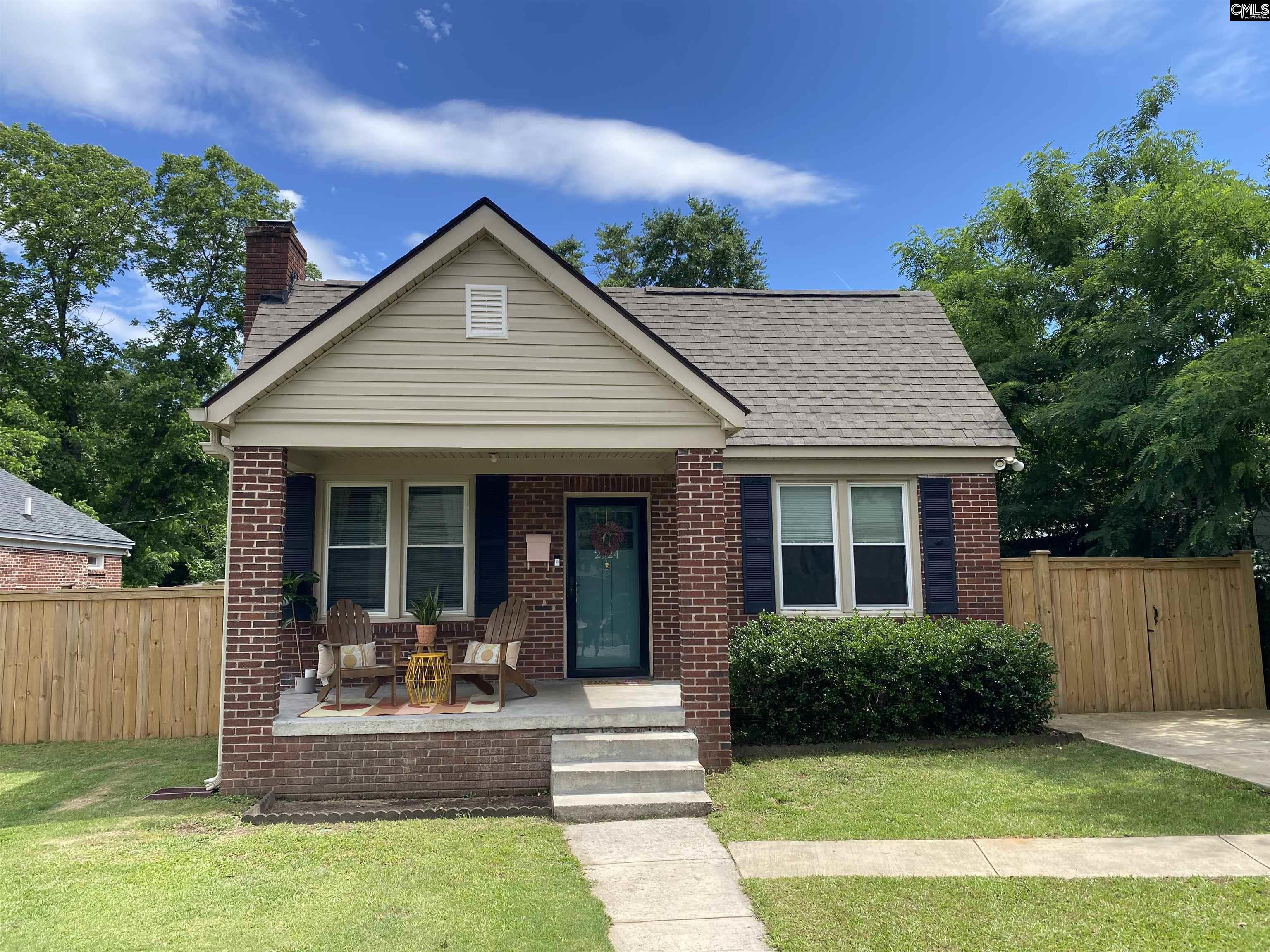 Welcome to this cute bungalow close to everything in the Rosewood community. Whether you are a first time home buyer, downsizing or looking for an investment opportunity, this home will fit your needs!  You will first notice a very relaxing and inviting covered front porch.  Step right into your cozy living room that features hardwood floors and a fireplace.  Next is a dining room that connects to the kitchen or hallway.  Situated on the right side of the home is two bedrooms, a bathroom and laundry hookups.  Exit the kitchen into your very own private backyard complete with new wood privacy fence, shed, peach tree and hammock for relaxing!  (Most recent updates include; new roof, windows, HVAC and water heater).  This home will not last long, book your showing today! Disclaimer:  CMLS has not reviewed and, therefore, does not endorse vendors who may appear in listings.