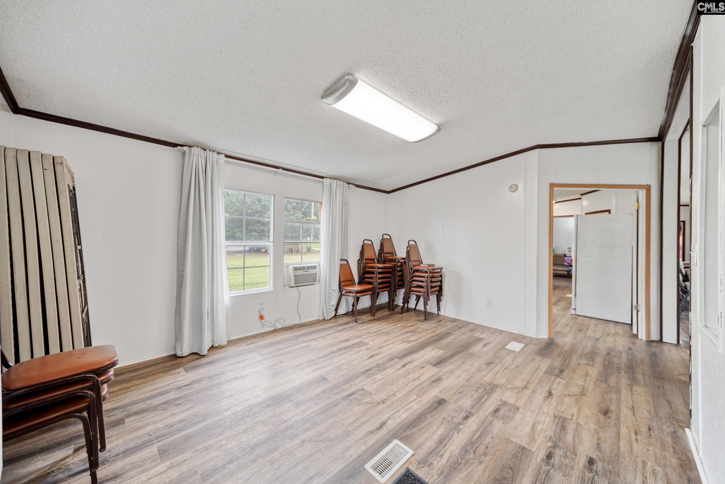 View from hall of the open living/dining area