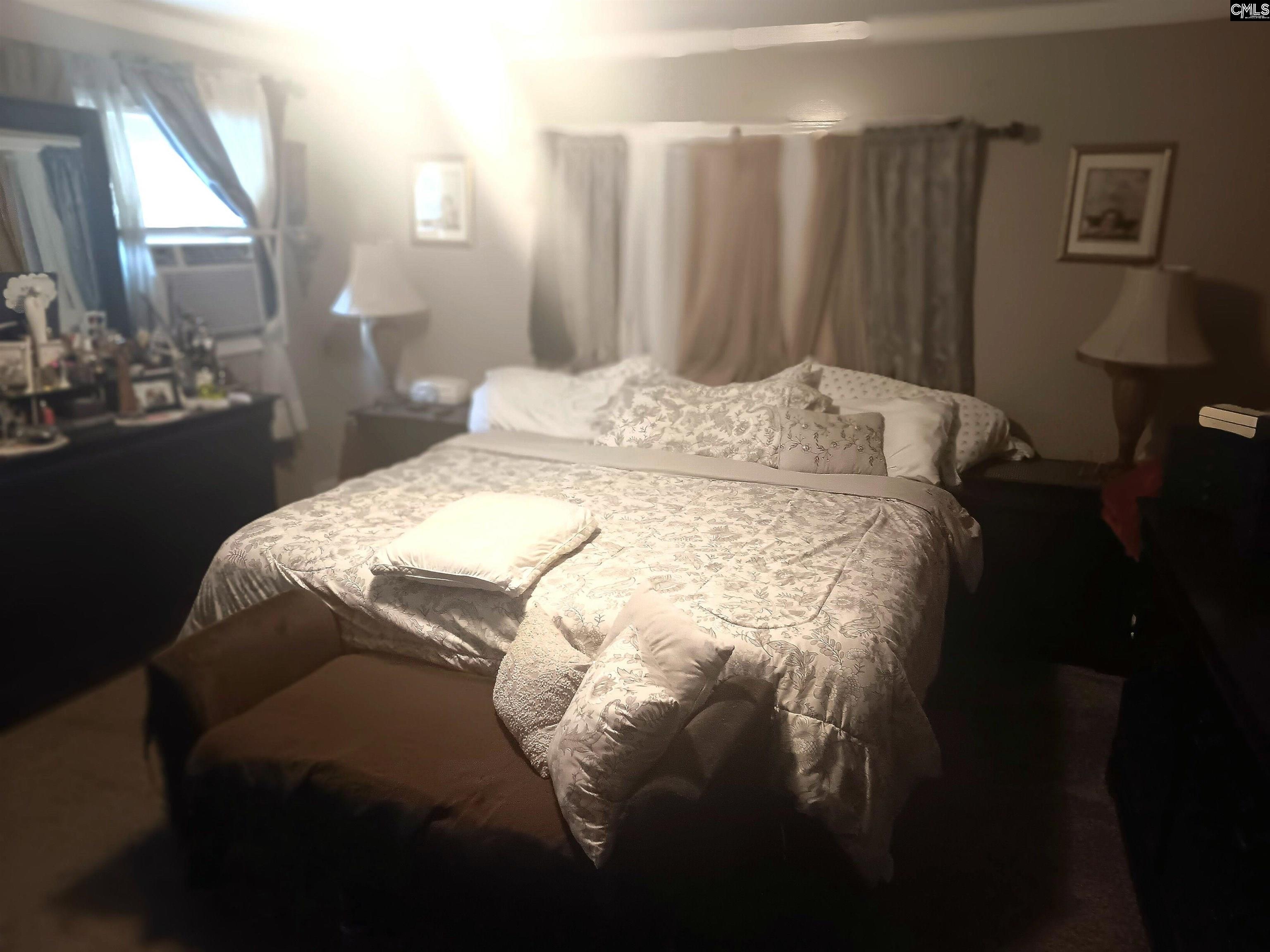 Enjoy this spacious addition with a full bathroom attached! Make it your own private comfort zone!