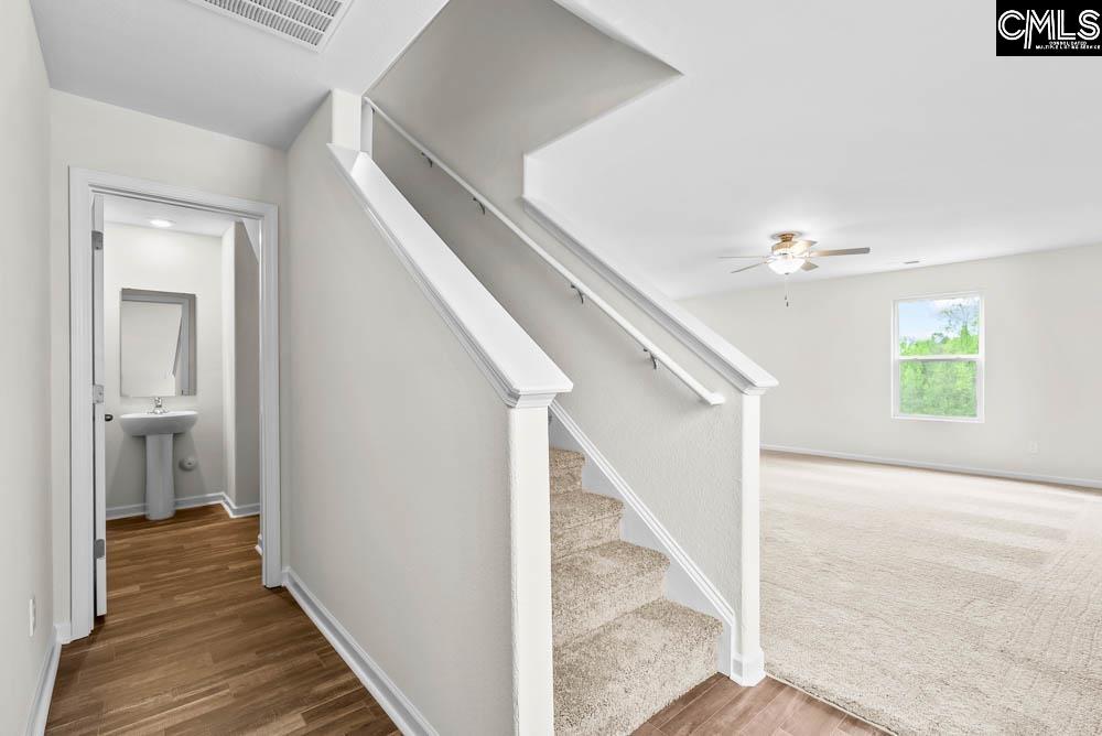 The half-bath is tucked away for maximum privacy.