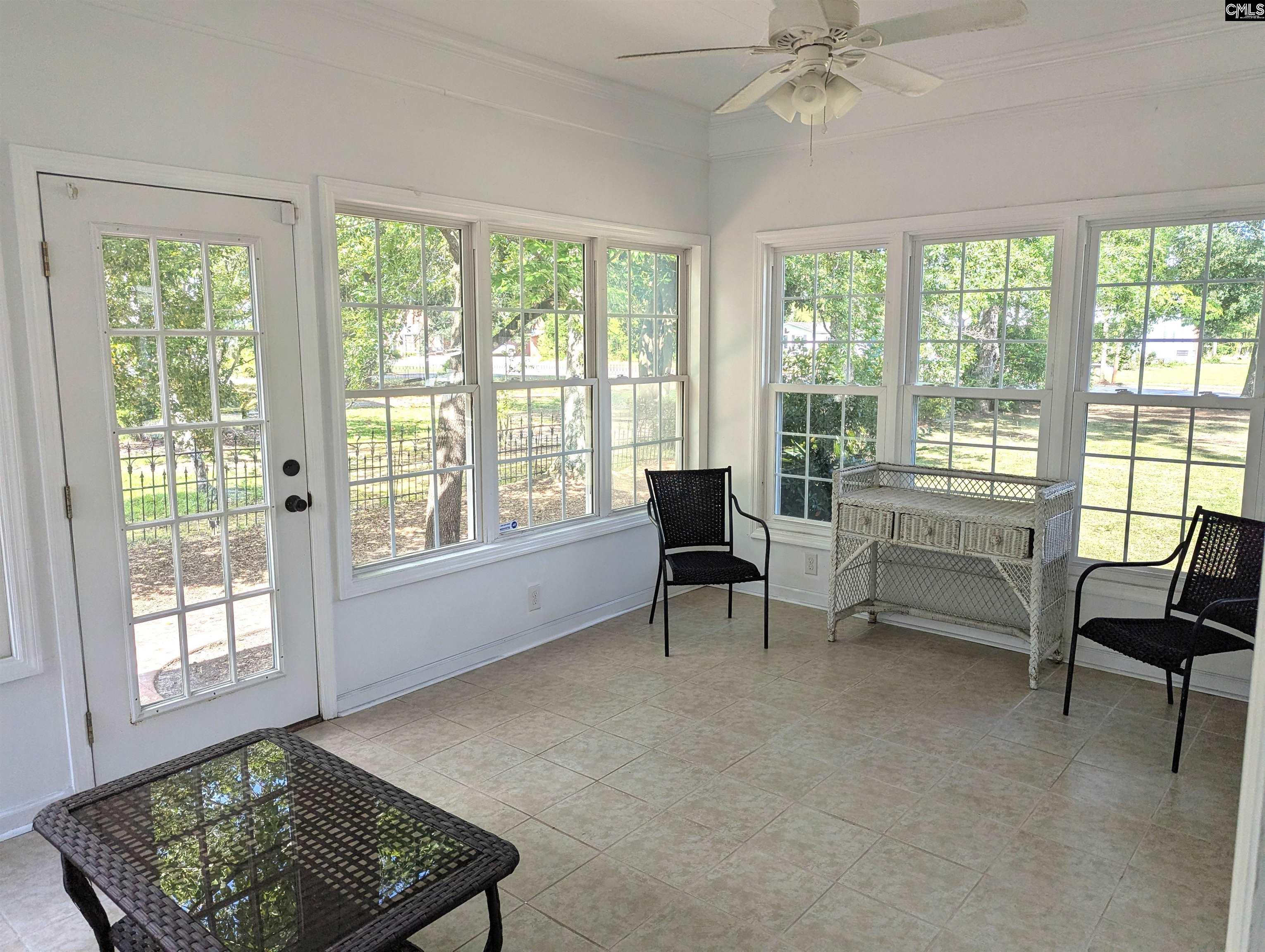 There are three doors. One from the front porch, one to the exterior and one to Din Room.