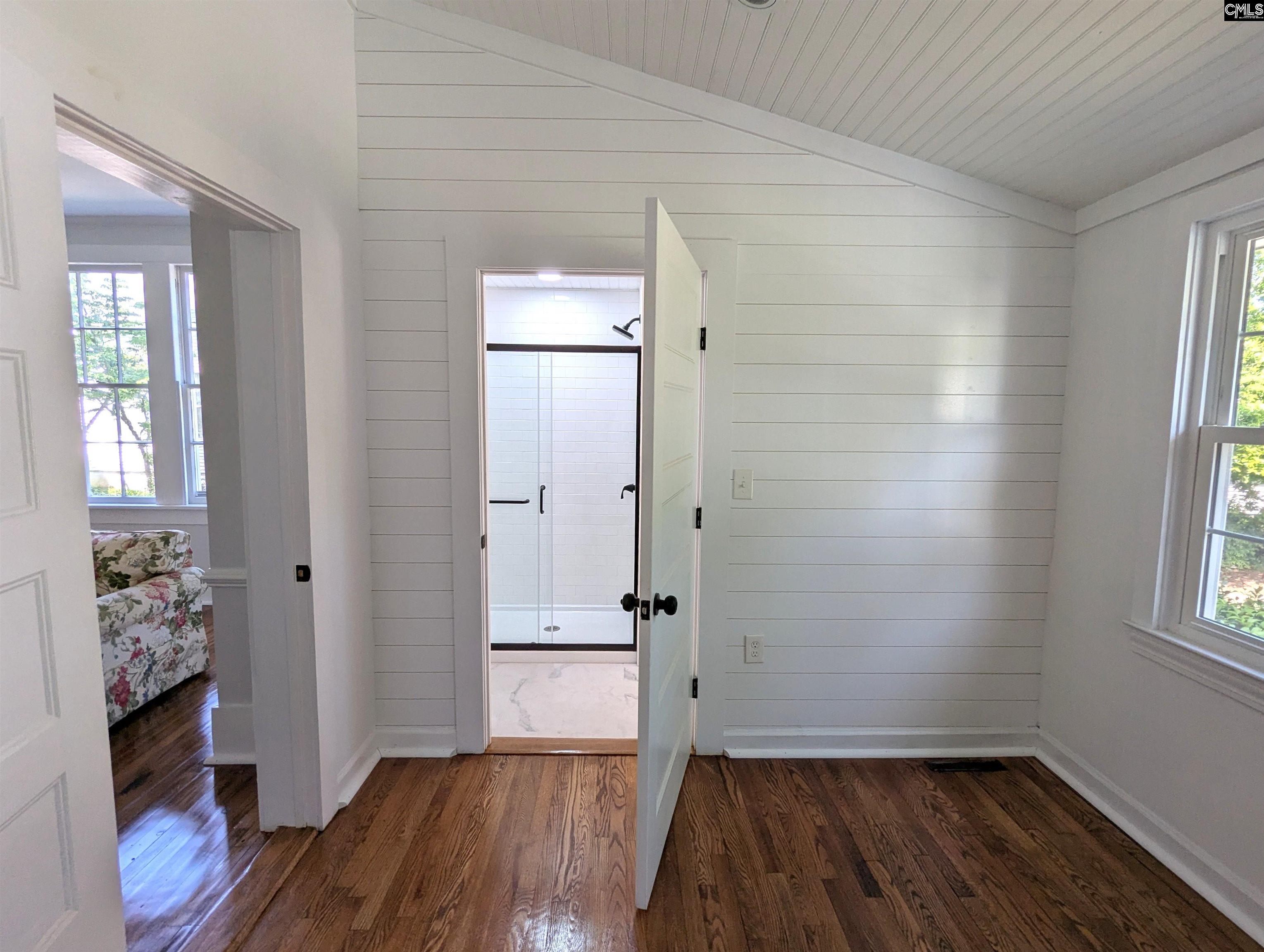 Ceiling was raised. Chimney removed, ship lap added, floors refinished. Doors and walls reconfigured