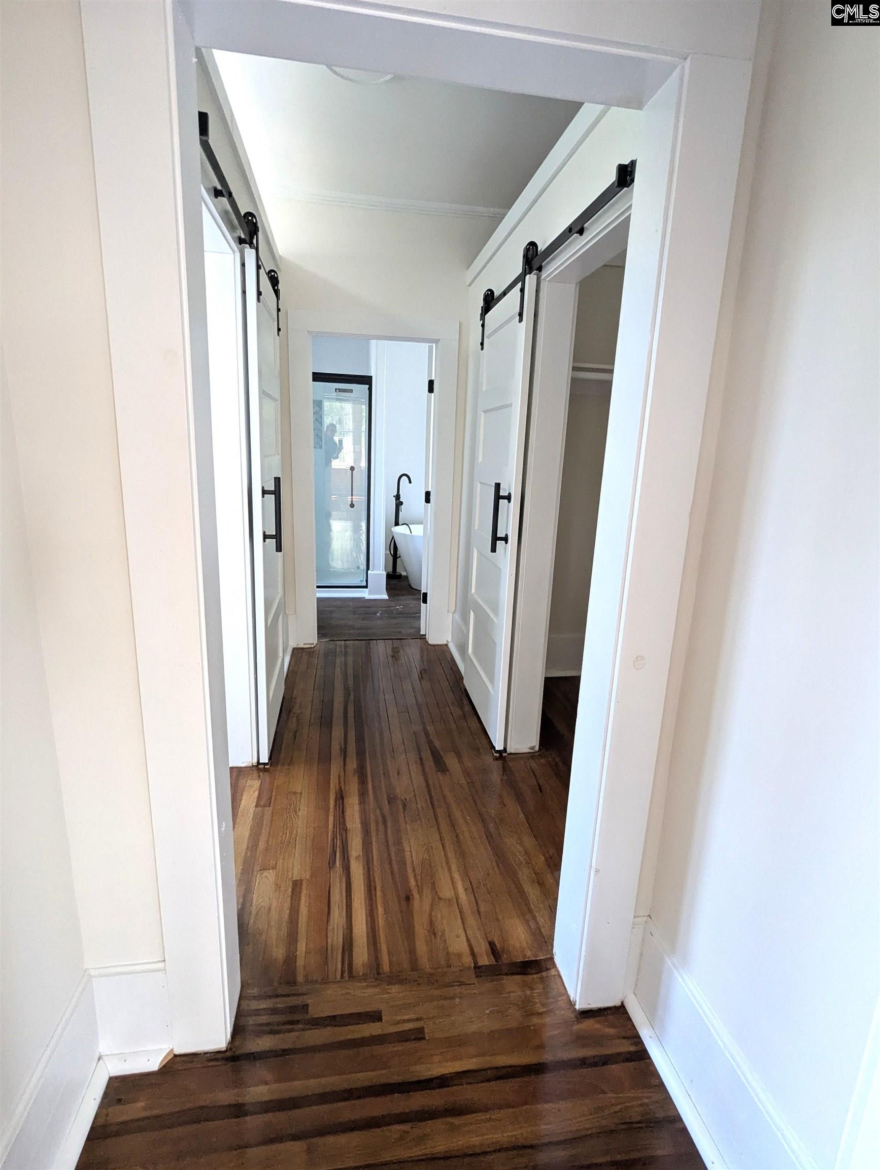 This is the hall between the primary Bedroom and the ensuite, private to the primary Bedroom.