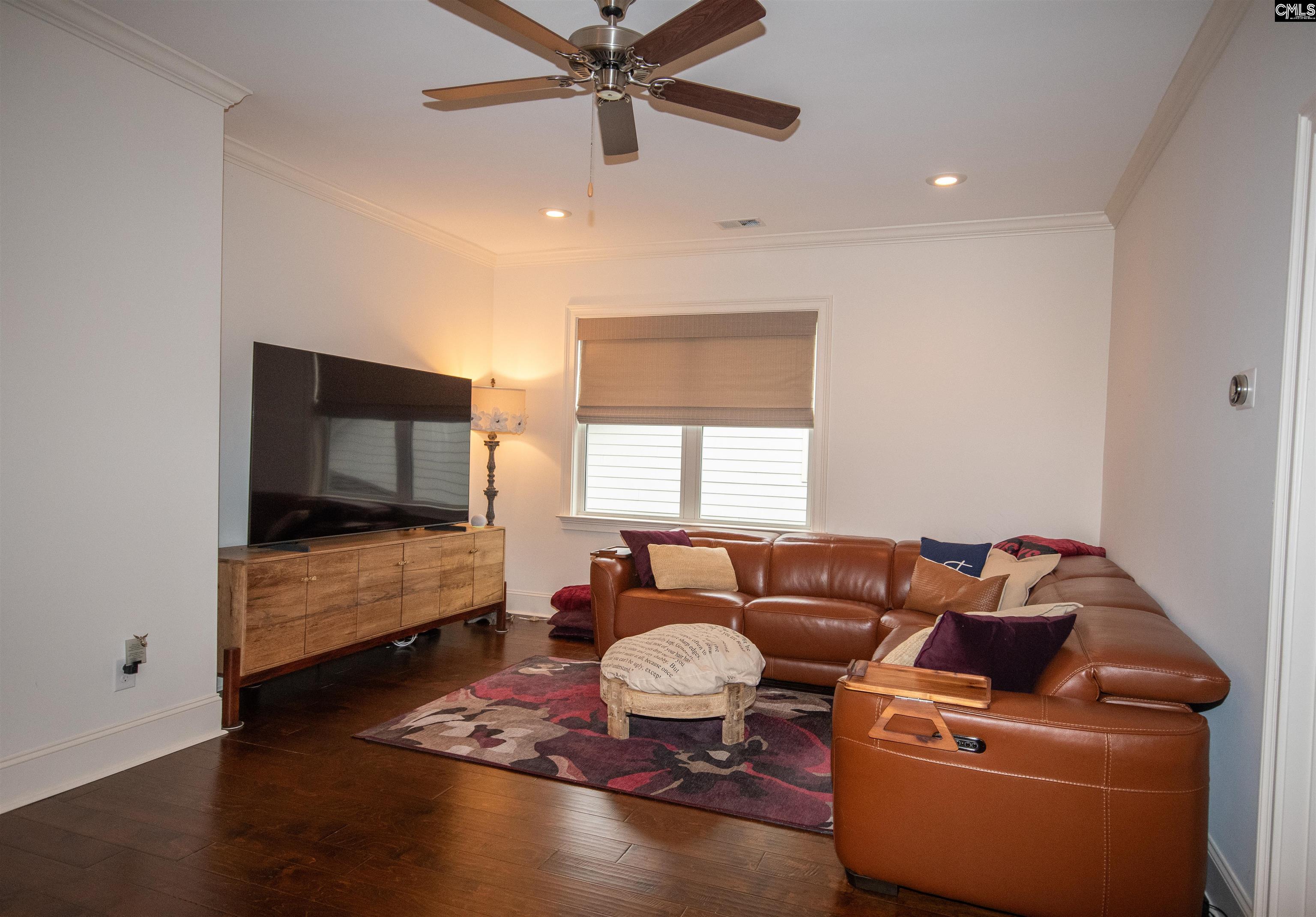 Perfect as a media area or 2nd living area with hardwood floors.