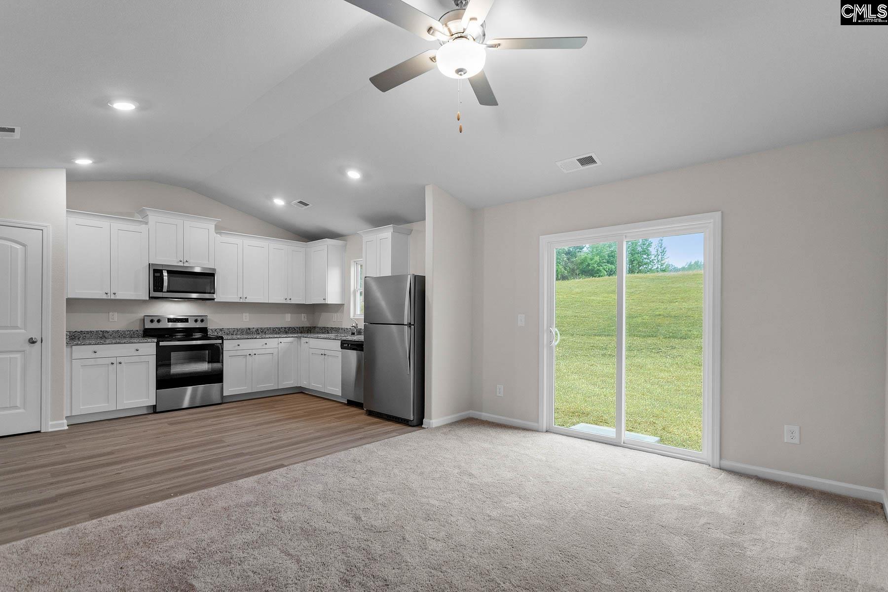 The family room is located directly off the kitchen, allowing for plenty of room to entertain.