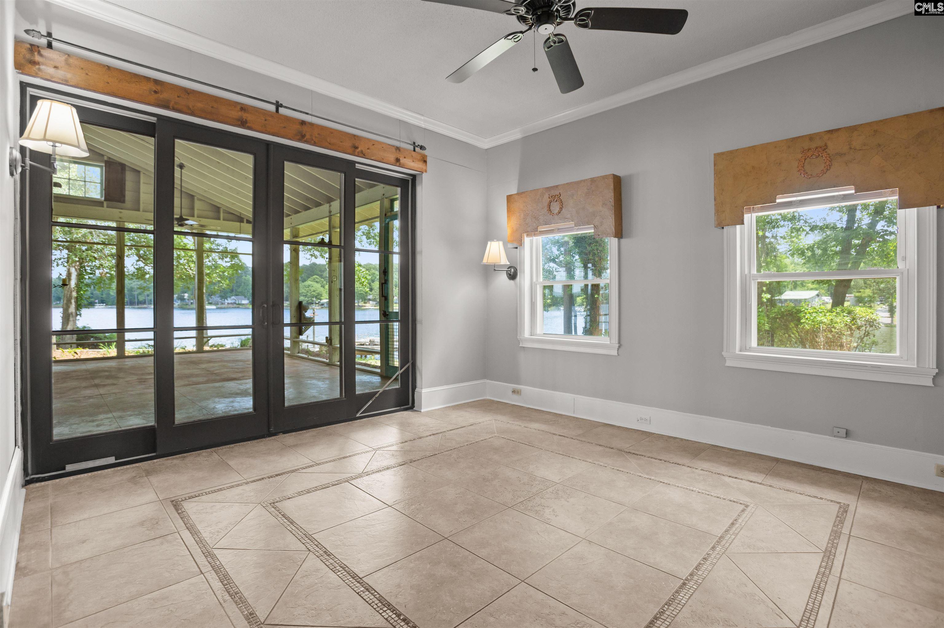 Could be used at a second primary bedroom with access to screened porch.