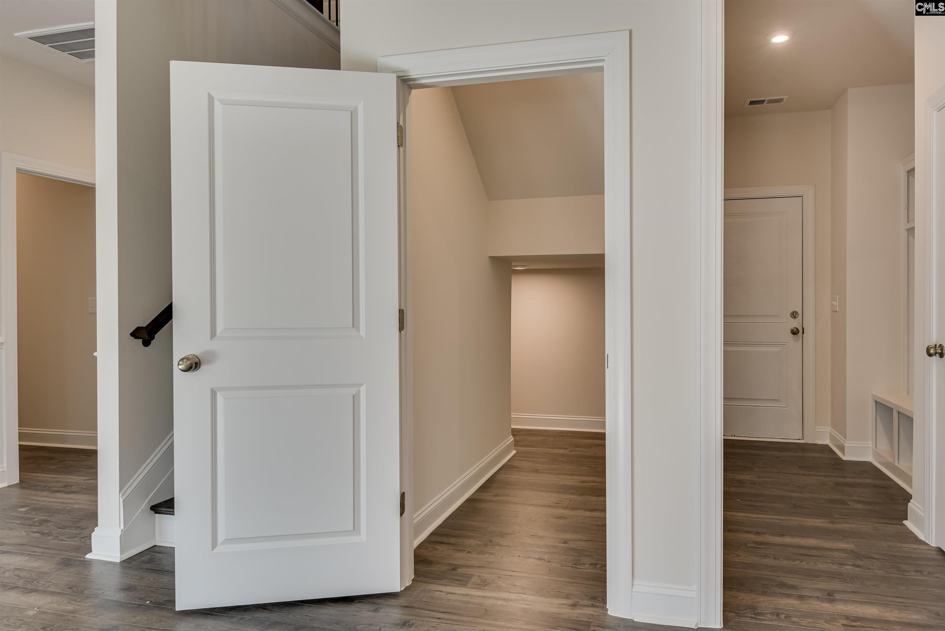 Storage closet under stairs - Great place to go during storms.