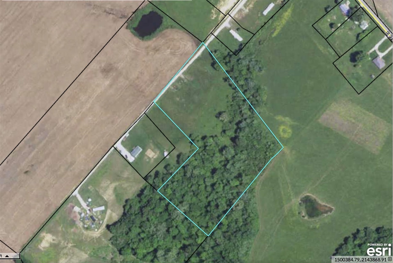 Large 7.02 acre track of land with with 3 separate home sites available. Per seller there are three electric meters, water meters and septic system. Selling together as one piece.