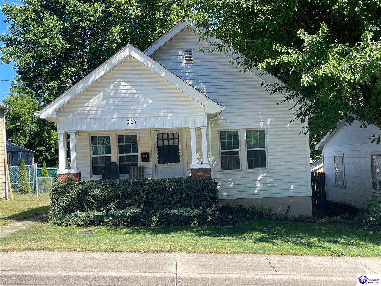 Great Classic Home in the Heart of Downtown Elizabethtown.  The home built in 1936 features 2 bedroom, a possible 3rd bedroom or office,1 bath, dining room,  a , and a great covered front porch.  It has newer vinyl windows and siding. Home is SOLD AS IS! Buyer and Buyer's agent to verify all information.