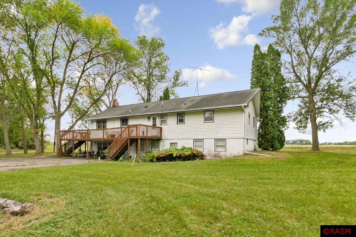 Embrace country living with this slice of peace and serenity. Sitting on approx. 2.3 acres, this property is very manageable! This property provides multiple outbuildings for all of your storage needs, consisting of a 32x68 machine shed, 30x40 3 stall garage and 24x28 oversized single stall garage! Additional exterior amenities include asphalt driveway from HWY 19 to the garages, upper level wrap around deck with a working elevator. Inside you will find this 5 bedroom has tons of potential! Upper level provides all necessary living amenities including 3 spacious bedrooms, 3/4 updated bathroom with a walk in shower, living room, kitchen, dining room, large laundry room with an additional 1/2 bathroom. Lower level family room with a wood burning fireplace! Other lower level amenities include a walk out basement with 2 additional bedrooms, living room, 3/4 bathroom and kitchen. Lower level could be used as a separate apartment if a buyer would choose. Lower level can use some TLC to suit your needs. Schedule your private showing today!