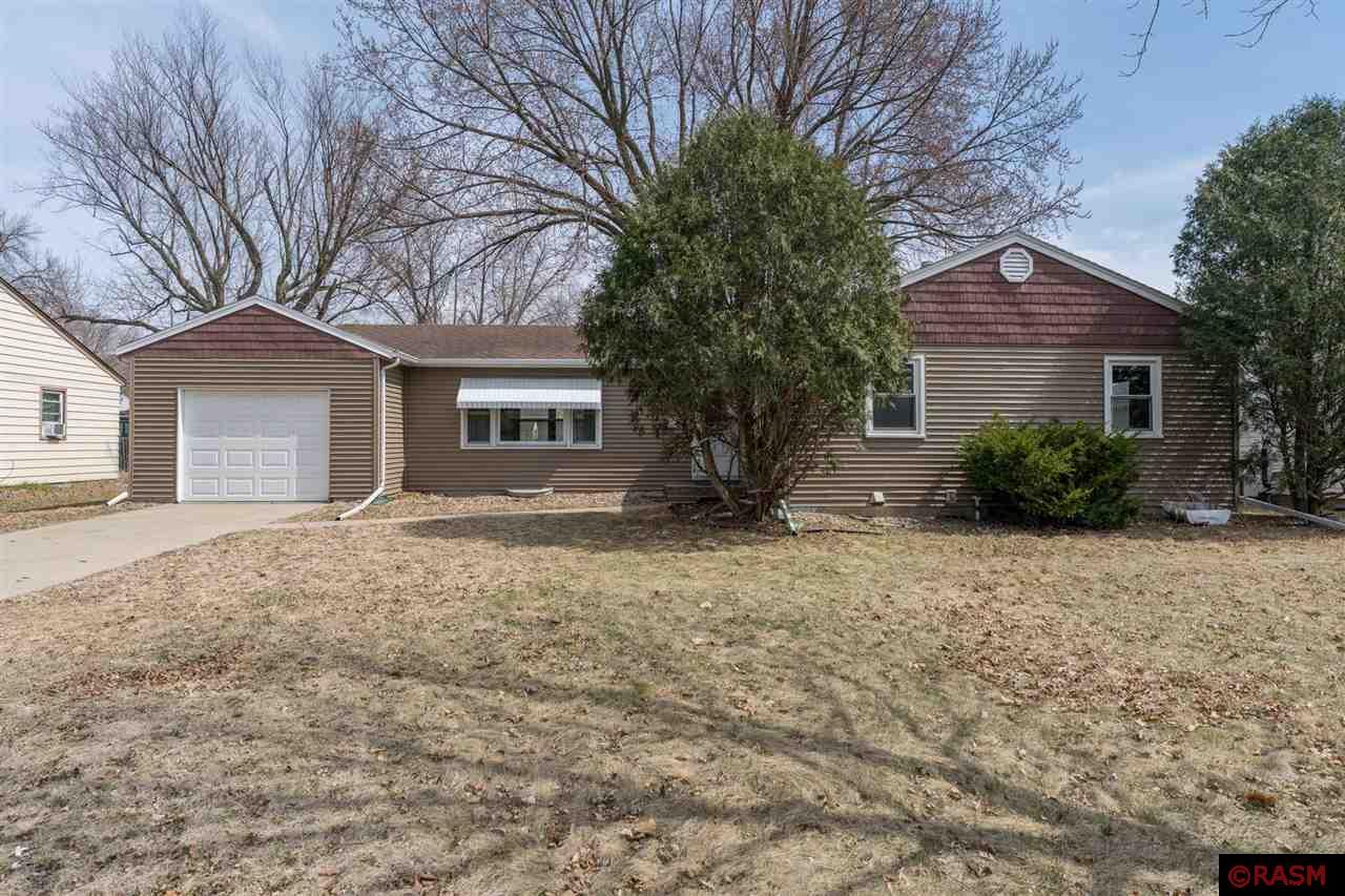 Welcome to this well maintained 4-bedroom, 2-bath ranch just steps from campus! This home features original hardwood floors on the main level, adding warmth and character throughout. The spacious living room is filled with natural light thanks to large picture windows, creating a bright and inviting space to relax or entertain. Downstairs, the basement offers endless potential—whether you're dreaming of a home office, gym, extra living space, or additional bedrooms, the possibilities are yours to shape.
