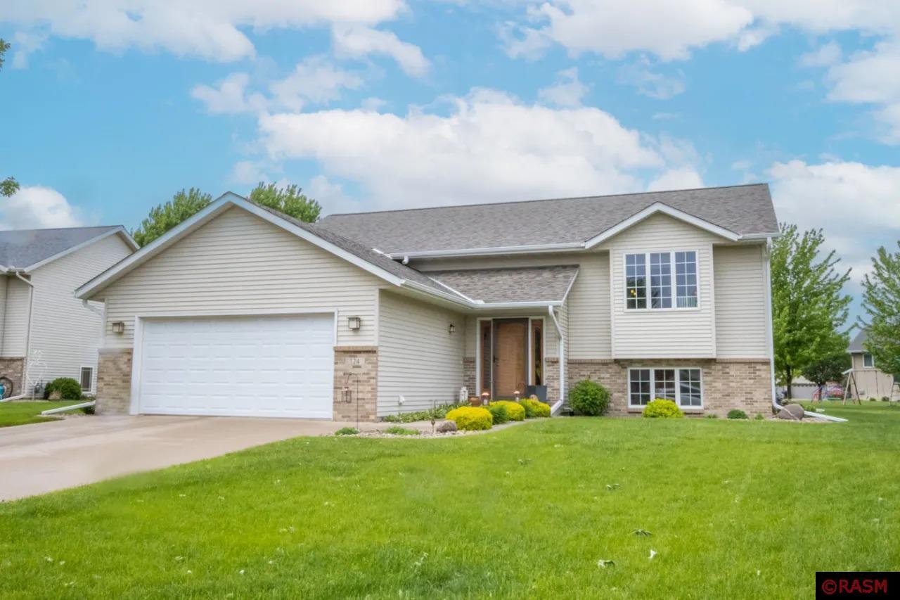 Spectacular just begins to explain this wonderful Mankato hilltop property.  Meticulously maintained with a welcoming feel; this one is sure to have you running to make it yours!  It offers 5 bedrooms, 2 bathrooms and a double garage.  A step through the front door has you greeted by the inviting foyer which will beckon you to ascend the stairs and find the attractive living room. A spacious kitchen/informal dining area combination with breakfast bar and vaulted ceiling, as well as a relaxing full bathroom and 3 generous sized peaceful bedrooms complete the upper level.  Descend back down the stairs to uncover the gem that is the lower level! There you will find an entertaining family room with a bar and game table space.  There is also a tranquil bathroom, 2 plentiful sized bedrooms and the laundry utility room.  The exterior of this outstanding property is polished with brick and vinyl siding, a spacious deck (that will be completely repaired), a substantial concrete patio, and a large storage shed.  What a treasure this one is; superb properties like these don’t come along every day! Run, don’t walk to snatch this one up!