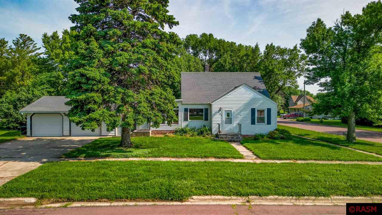 Welcome to this charming 2-bedroom, 2-bath home nestled on a spacious corner lot in Lewisville, MN! Located right next to the town’s baseball field, this home offers small-town living at its finest. Enjoy a bright and airy sunroom—perfect for morning coffee, relaxing afternoons, or kicking off your boots and jackets during the winter months. The main level features washer/dryer hookups for convenient single-level living, along with fresh paint and thoughtful updates that give the home a polished, move-in ready feel. Step out onto the back deck and take in the peaceful surroundings during the warmer months. Whether you're looking for your first home, a quiet place to downsize, or an easy-to-maintain investment, this home has everything you need to live simply and comfortably.