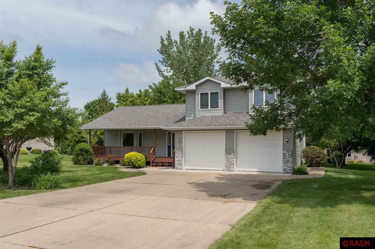 Don’t miss this rare opportunity to own a beautifully cared-for, one-owner home in the fantastic city of Glencoe! Conveniently located near the Glencoe Golf Club, this 4-bedroom, 3-bathroom gem offers space, comfort, and quality throughout. The main level features an expansive open-concept layout that’s perfect for everyday living and entertaining. Upstairs, you'll find three spacious bedrooms, including a stunning primary suite complete with a private bath and walk-in closet. The lower level offers even more space with a fourth bedroom, large family room, kitchenette/bar area, and a full laundry room. Homes like this don’t come around often. Schedule your private showing today and make this exceptional property yours!