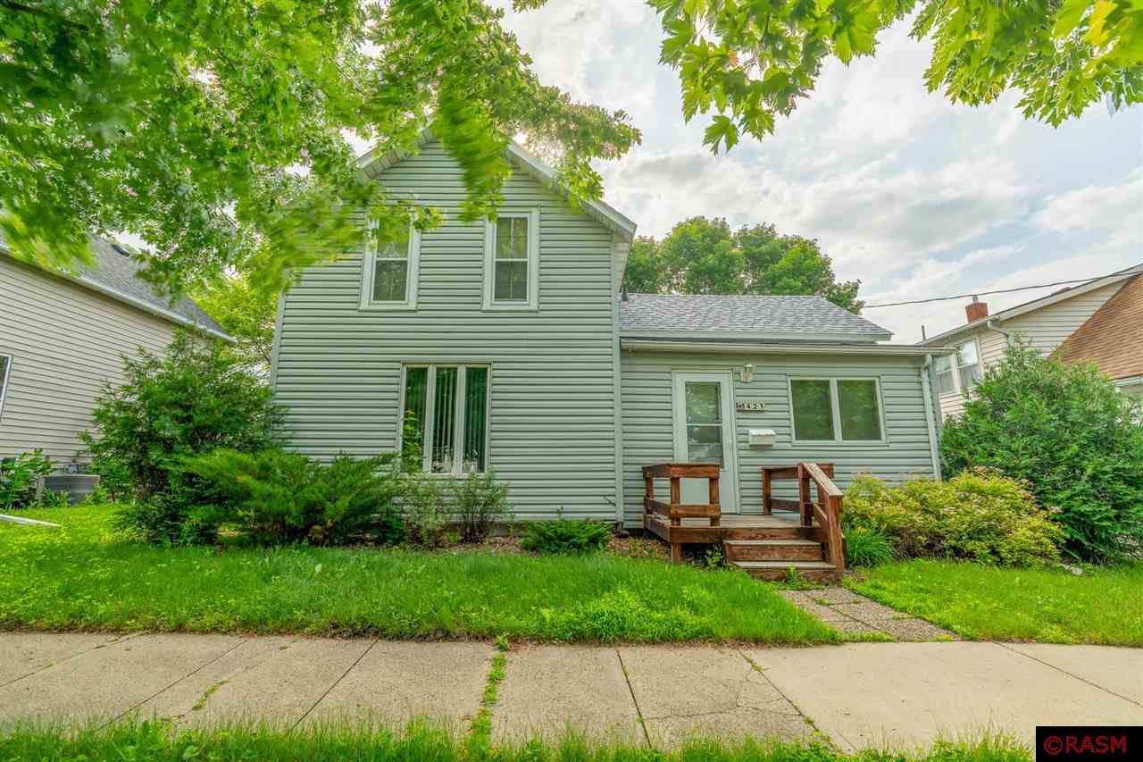 Well-maintained 3-bedroom, 1.5-bath home conveniently located near downtown and the local hospital. The main level features a spacious living room with a gas fireplace, an eat-in kitchen with a gas stove, pantry, and dishwasher, plus a breakfast room, laundry area, and two bedrooms with a half bath. Upstairs includes a third bedroom, full bath, a versatile landing area perfect for a home office or flex space, and a walk-in attic offering excellent storage.  Exterior highlights include front and back decks for outdoor enjoyment, a 2018 asphalt roof on both the home and detached 2-car garage, vinyl siding, updated exterior storm doors, and a mix of double-hung and crank-out double-pane windows. The home also features central air and a 100-amp breaker panel. The basement was rebuilt and braced in June 2025.  Move-in ready with great proximity to local amenities — ideal for homeowners or investors alike.