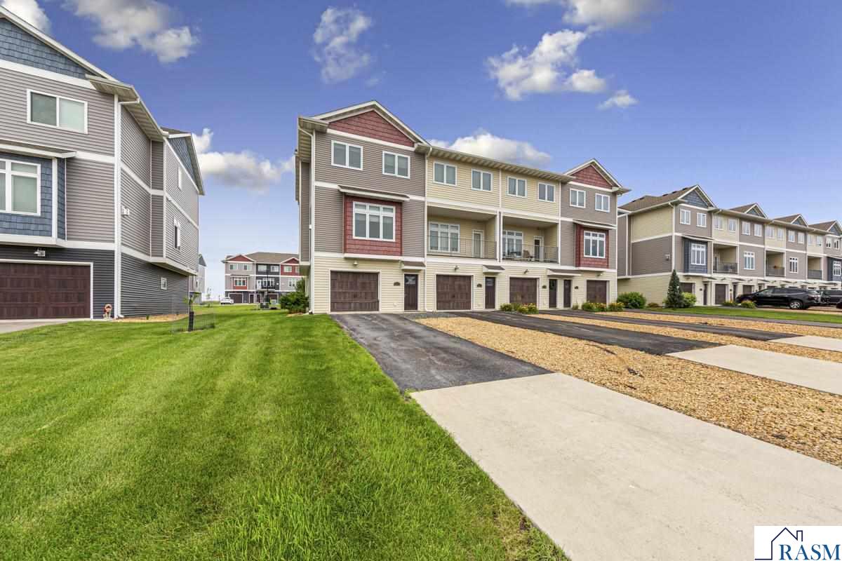 Great 4-bedroom 3-bathroom townhome in Upper North Mankato. There is a rental license on the property and is currently being rented month to month for $2100. Laundry is on the main floor with kitchen, 1/2 bath, deck, and living room with gas fireplace. The upstairs level has 4 bedrooms, with the primary bedroom having its own bathroom and walk- in closet. This is an end unit, which rarely this units come up for sale. Enjoy all the natural light. 2 car tandem garage.