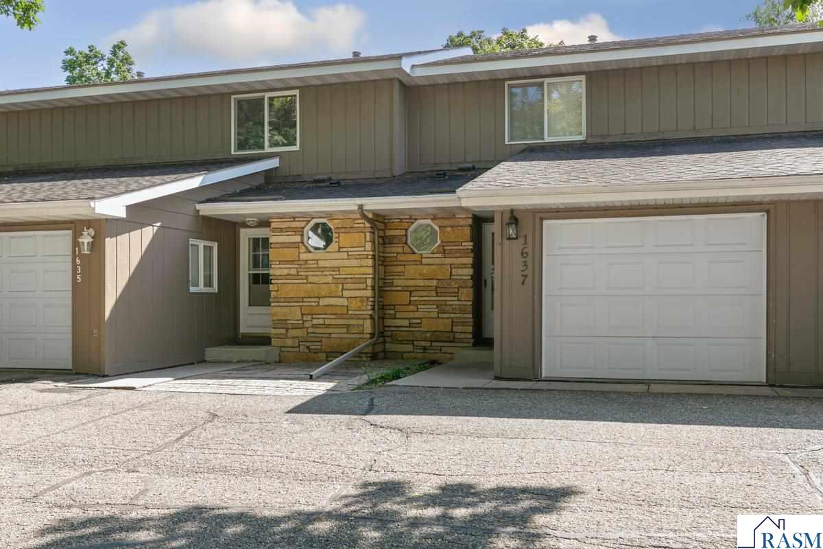 Welcome to this 4 bedroom, 3 bathroom townhome with a great floor plan. Main floor has guest bathroom, open floor plan with living room, kitchen and dining room, along with large 16x12 deck that overlooks the large courtyard/green space. The upper-level hosts 3 really nice bedrooms with ample closet space. Including 2 closets in primary bedroom, one being a nice size walk in. Lower level is finished with new flooring, new water heater, laundry, 3/4 bathroom and a versatile space of 21x15 that can be used as a family room or a bedroom. All stainless appliances and washer and dryer are included.