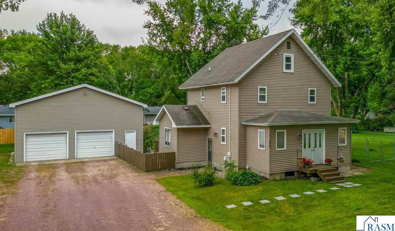 With a stately presence, over-sized garage, fenced yard and loads of character, this Mapleton property is one you'll want to see. The main floor features a mudroom entryway off the deck, 1/2 bath, large kitchen, dining room, living room, playroom/office (or bedroom), and laundry area w/current home office space. Upstairs on the 2nd floor, 3 bedrooms, a full bath, AND access to the 3rd floor attic space await; this would make great finished space! The basement offers more storage options and is currently used as a 2nd home office. The large deck is ideal for entertaining or relaxing, there is plenty of space for gardening, playing and more. At 900 square feet, the garage is an absolute dream space! With hardwood floors throughout the main floor, original woodwork throughout, tasteful updates, and plenty of additional potential to maximize living spaces, plus proximity to the city park and school, this charming property is a must-see!