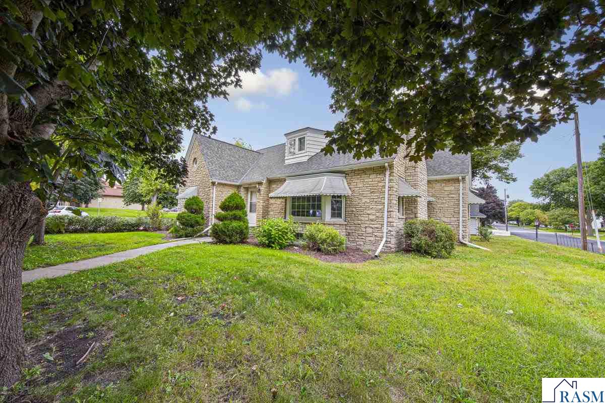 Let's call Gaylord home! Located on a large corner across the street from the county courthouse and less than 3 blocks from downtown! It’s eye catching stone exterior provide provides charm and character to this four bedroom home! Inside you will find a large living room with a fireplace, formal dining room, three season sunroom, eat in kitchen, full bathroom and two bedrooms! Upstairs, you will find additional bedrooms and bathroom! Lower level has a spacious family room with another fireplace, storage space and another half bathroom! Outside, you will find a two stall, detached garage! Schedule your private showing today!